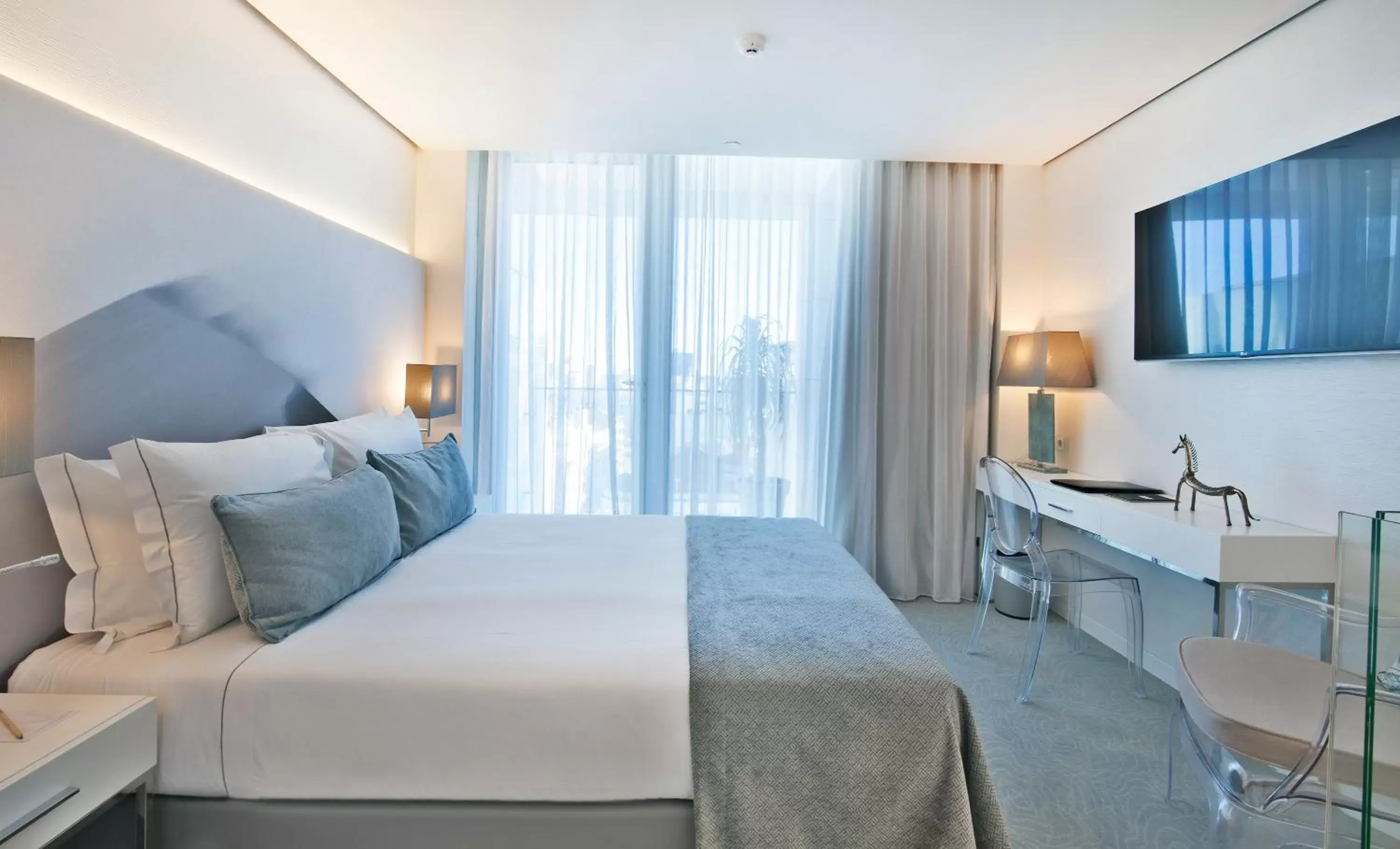 Bed in Hotel White Lisboa