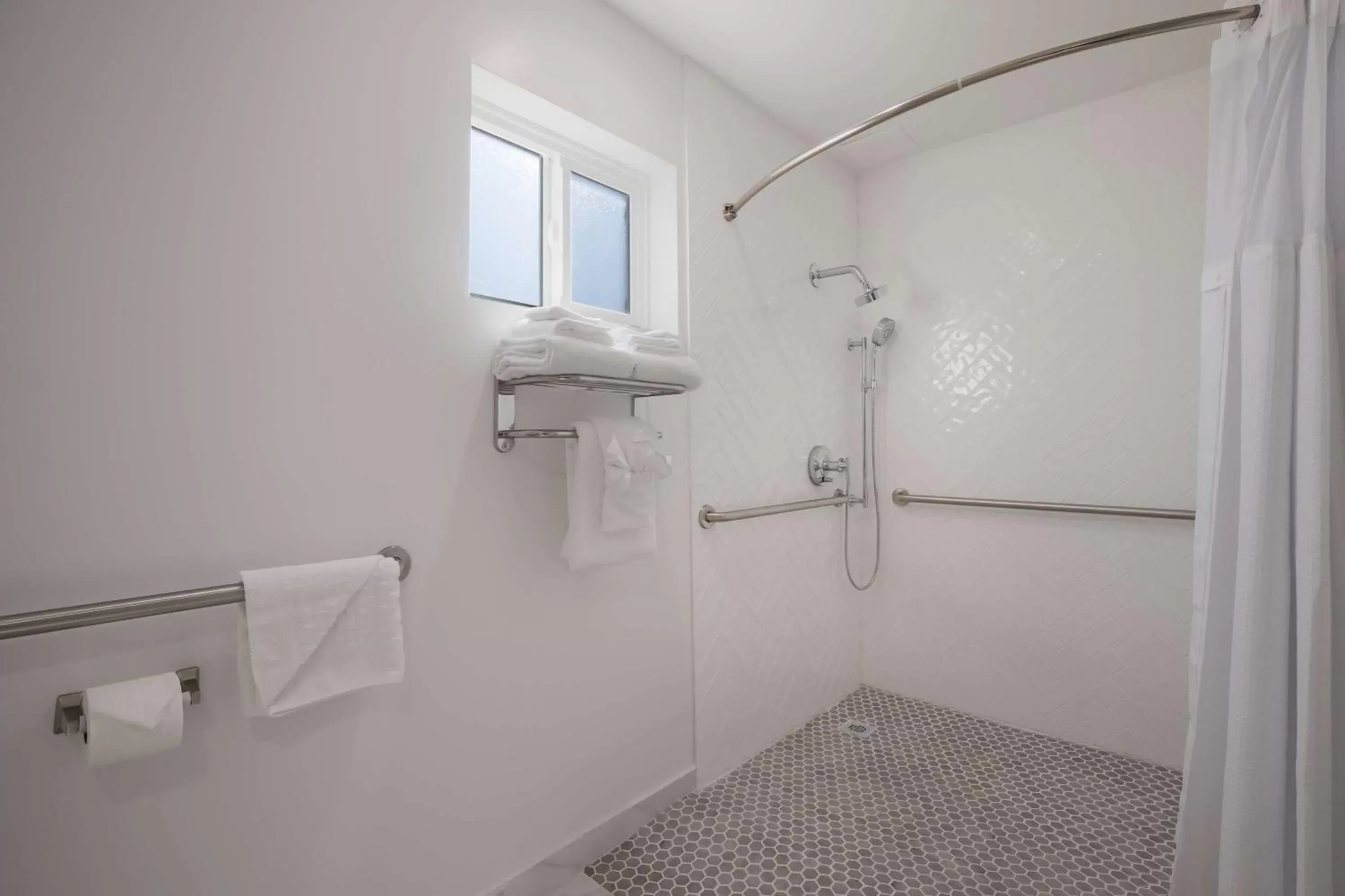 Bathroom in SureStay Plus Hotel by Best Western Upland - Ontario North