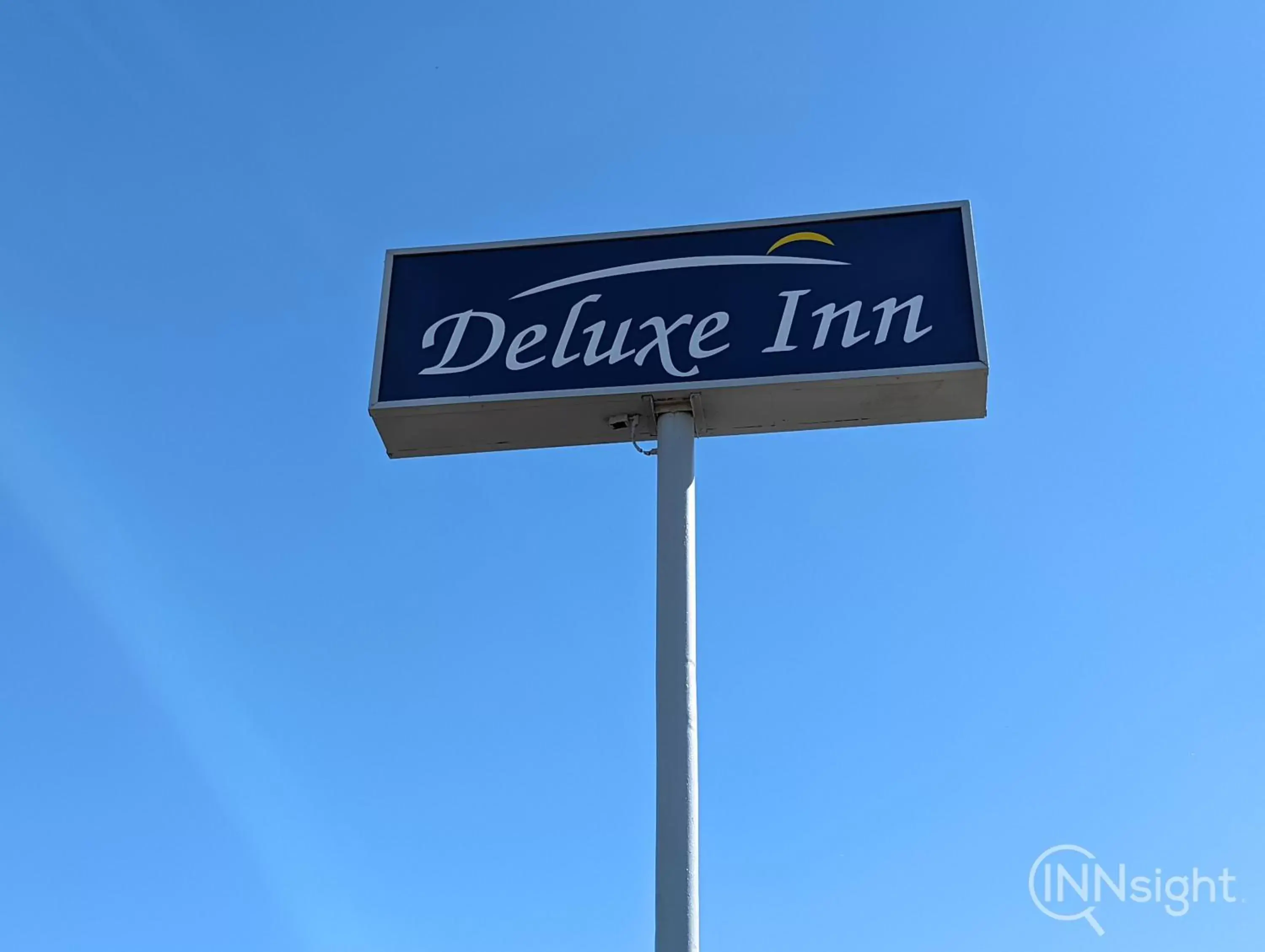 Property logo or sign in Deluxe Inn