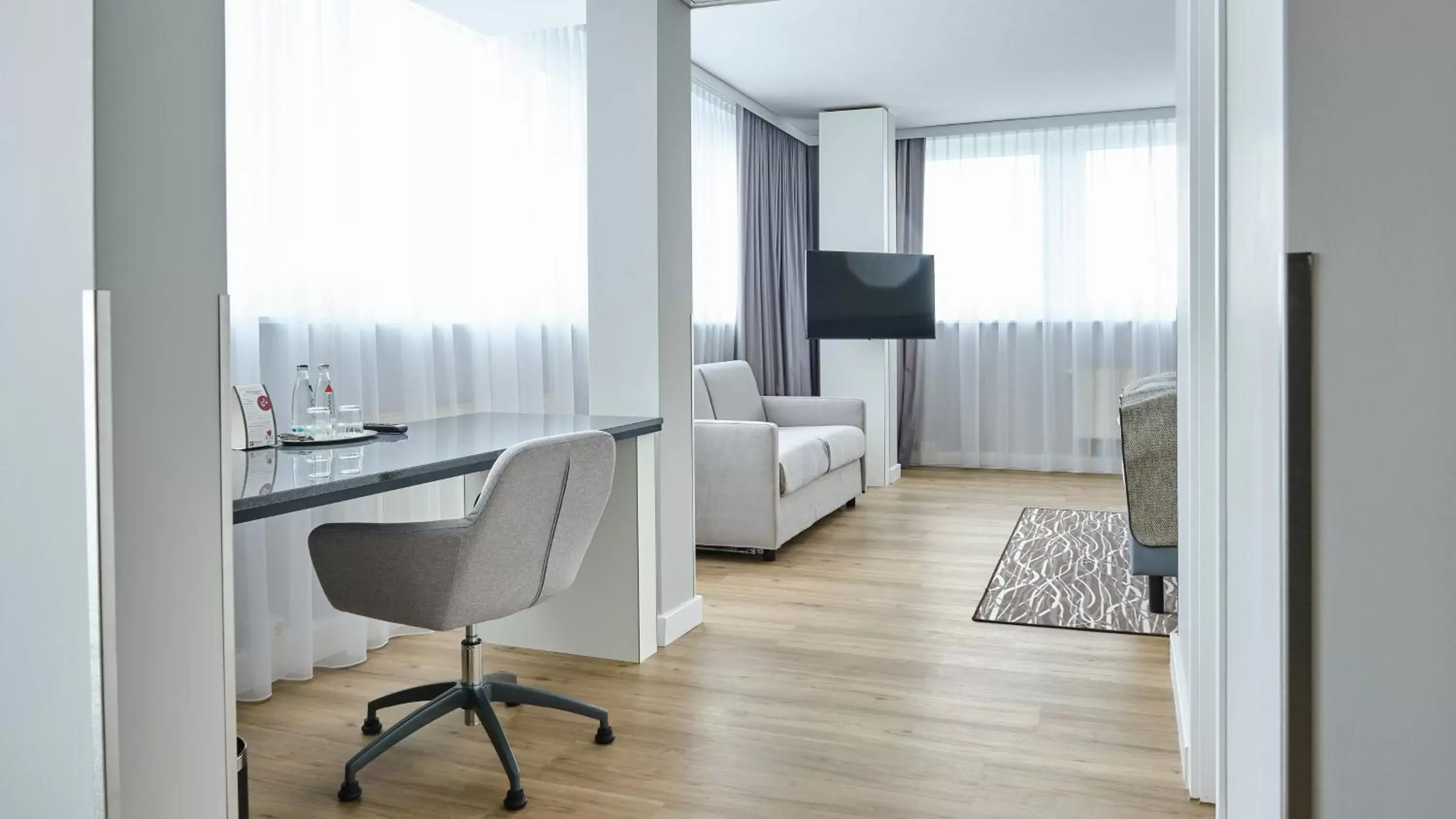 Photo of the whole room, Seating Area in Holiday Inn Berlin Airport - Conference Centre, an IHG Hotel