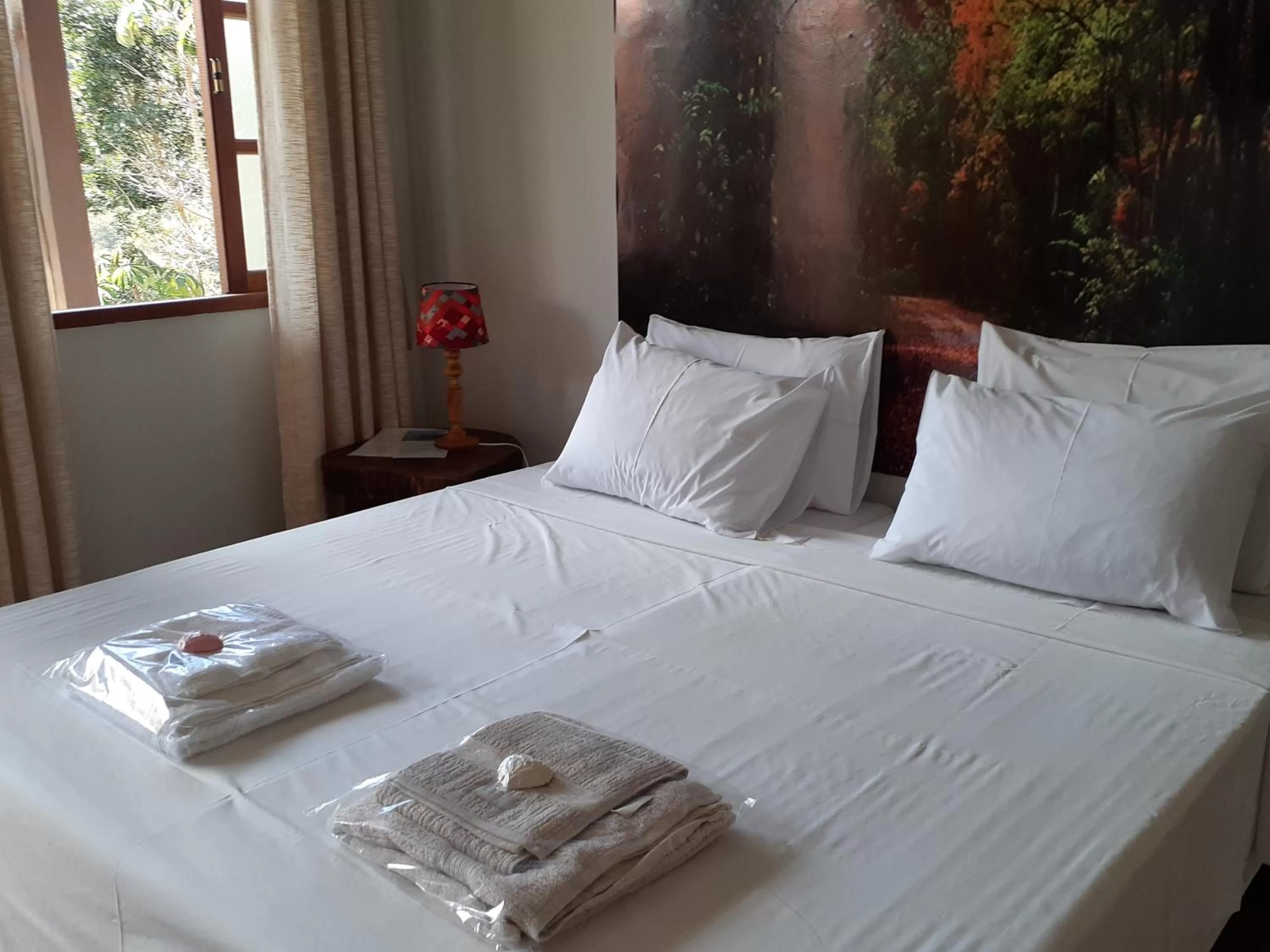 Bed in Pousada R.N.C. Nosso Paraíso