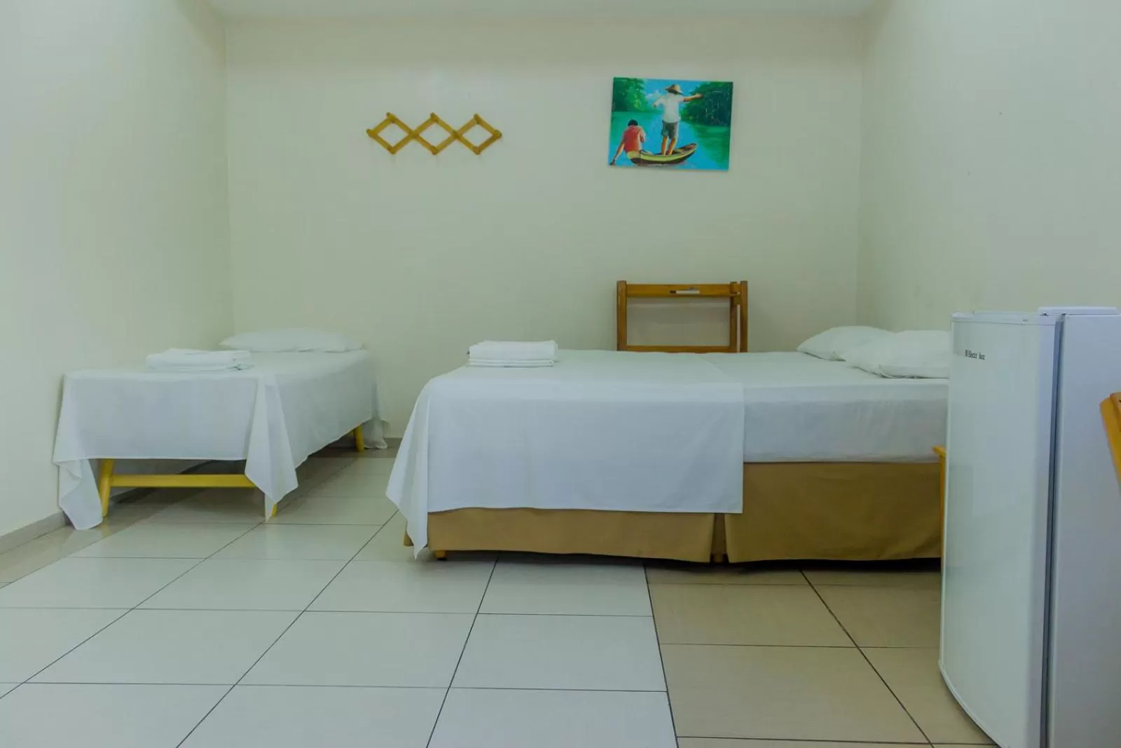 Bed in Pousada Vila do Carmo