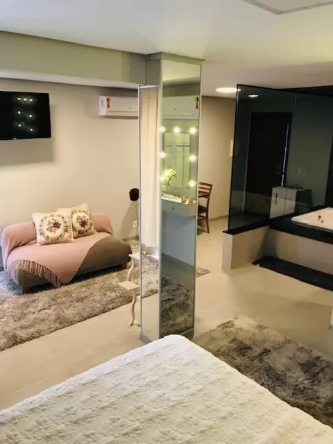 Communal lounge/ TV room, Bed in 103 Hotel & Flats
