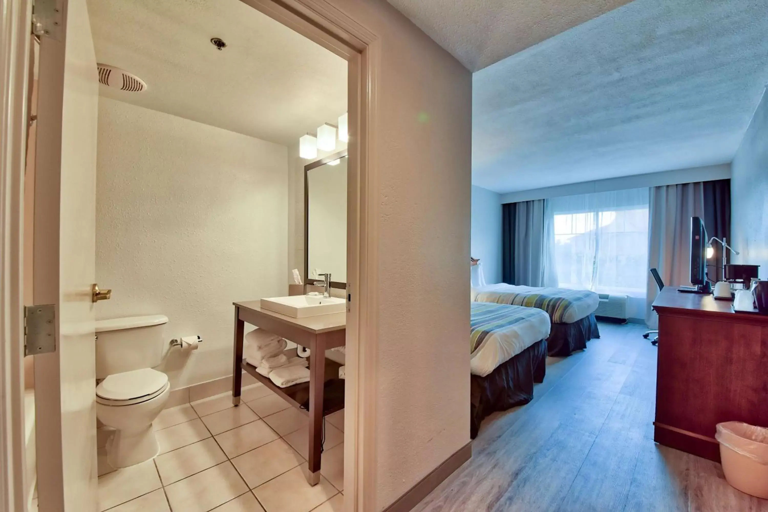Bathroom in Country Inn & Suites by Radisson, Ocala, FL