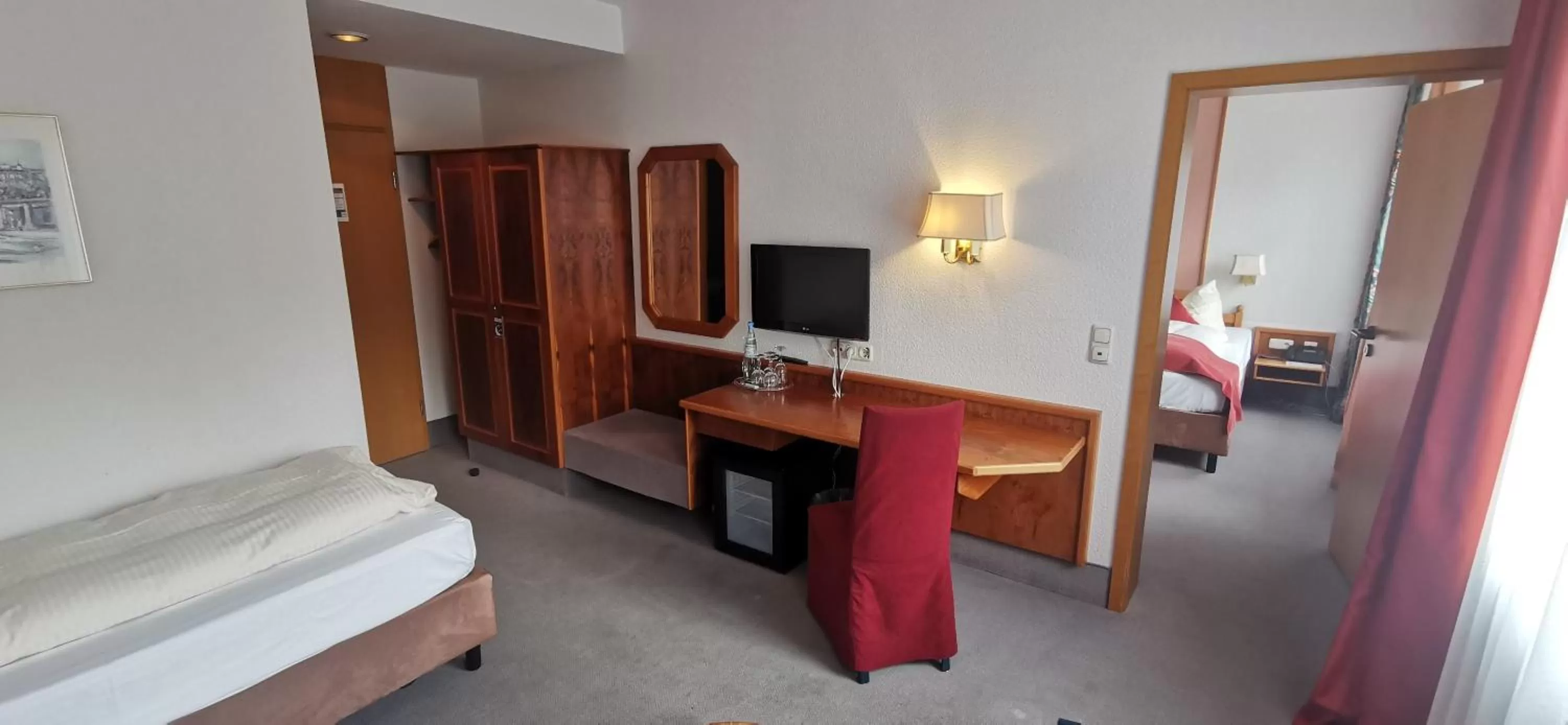 Photo of the whole room, Bed in Heidehotel Soltauer Hof