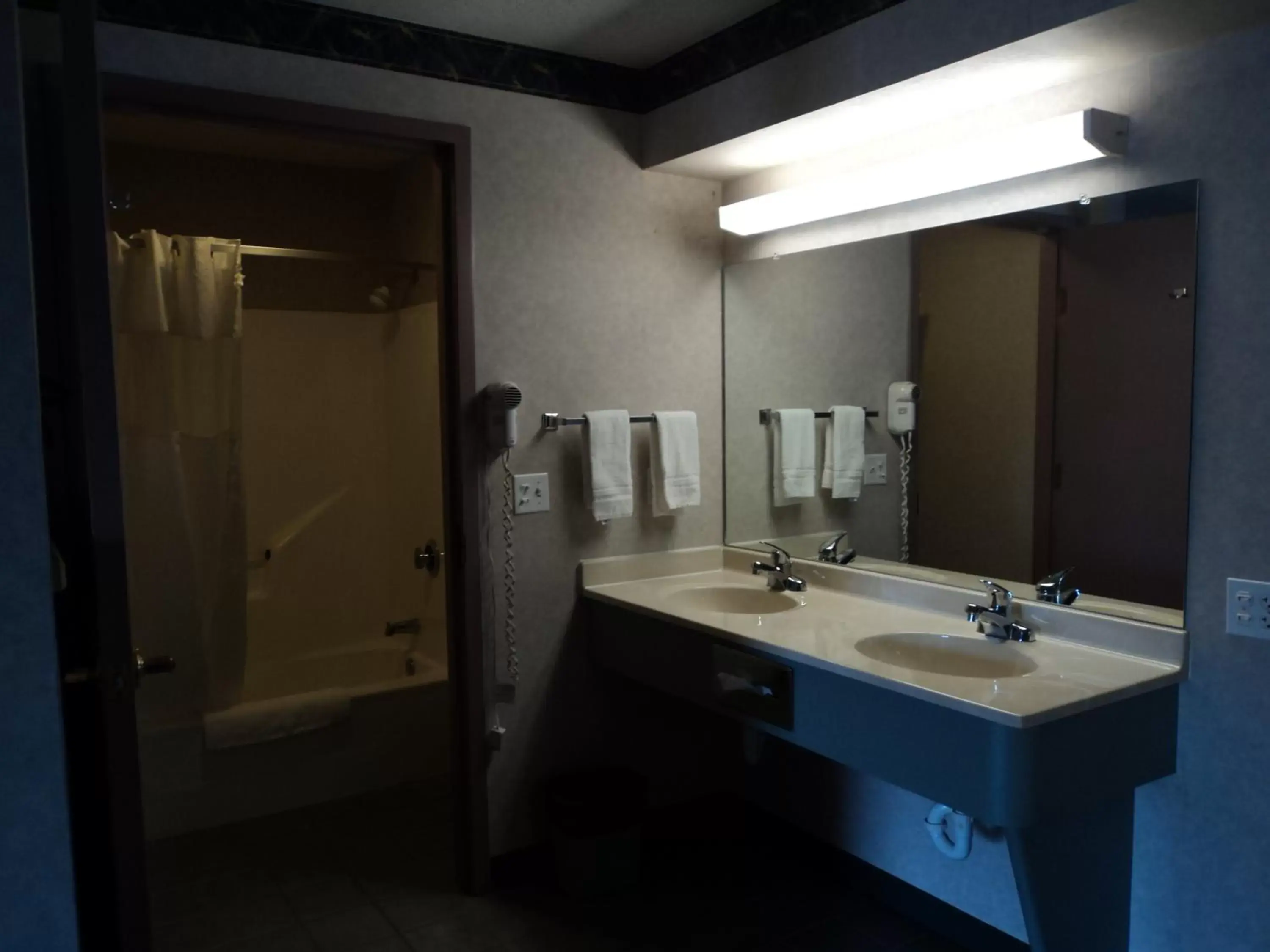 Photo of the whole room, Bathroom in Knights Inn Ottawa