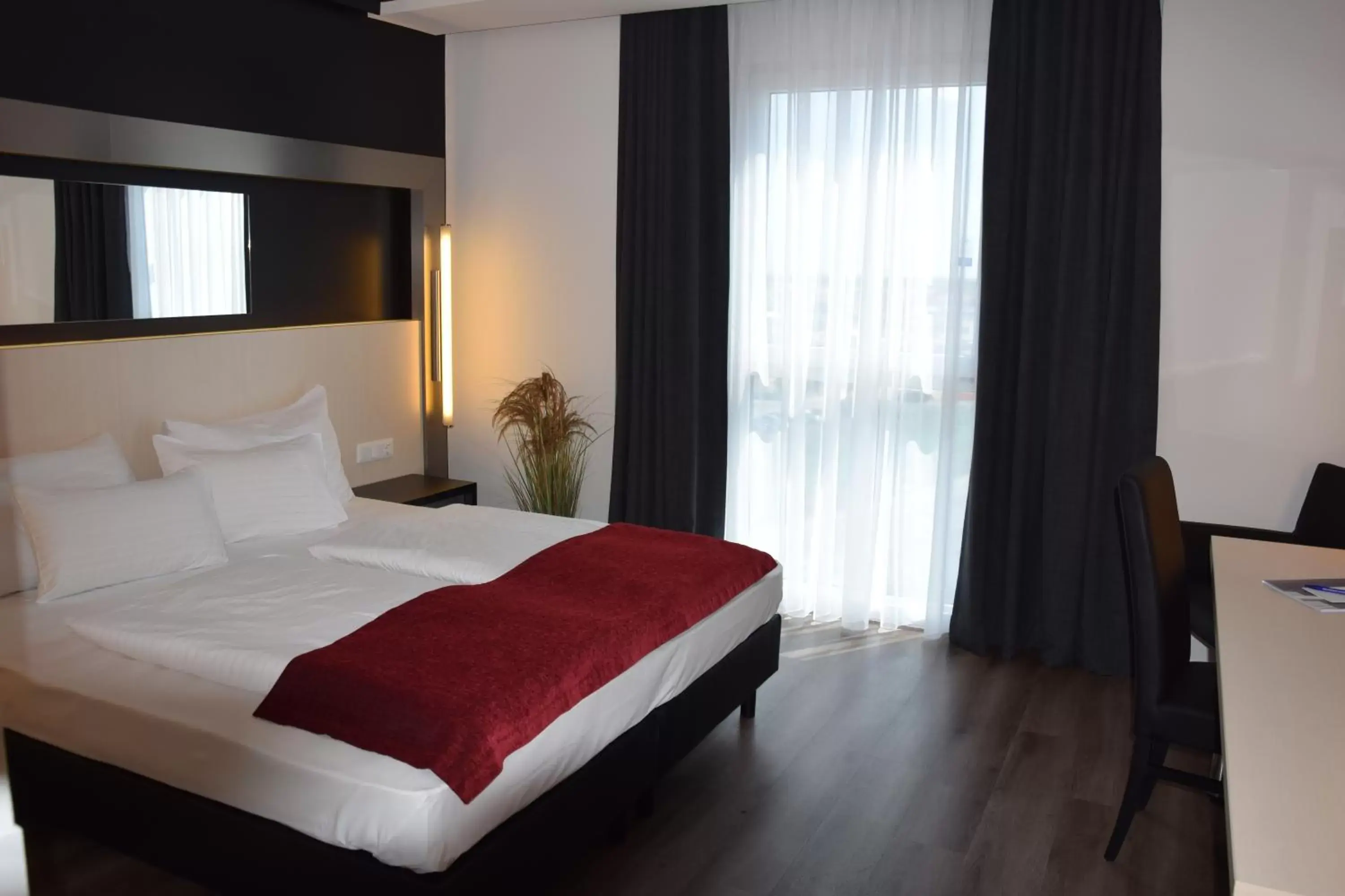 Photo of the whole room, Bed in Pannonia Tower