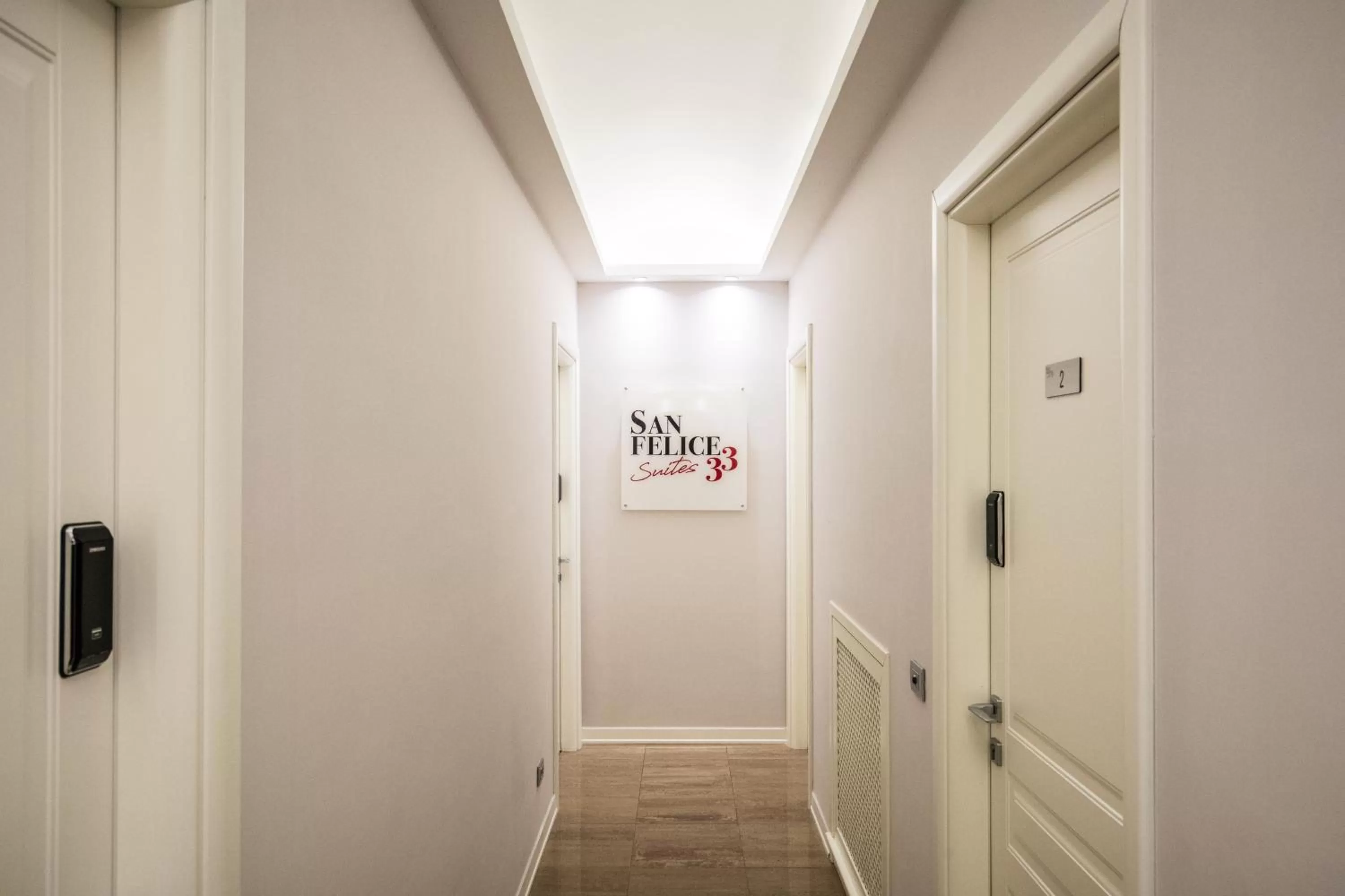 Property logo or sign in Sanfelice 33 Luxury Suites