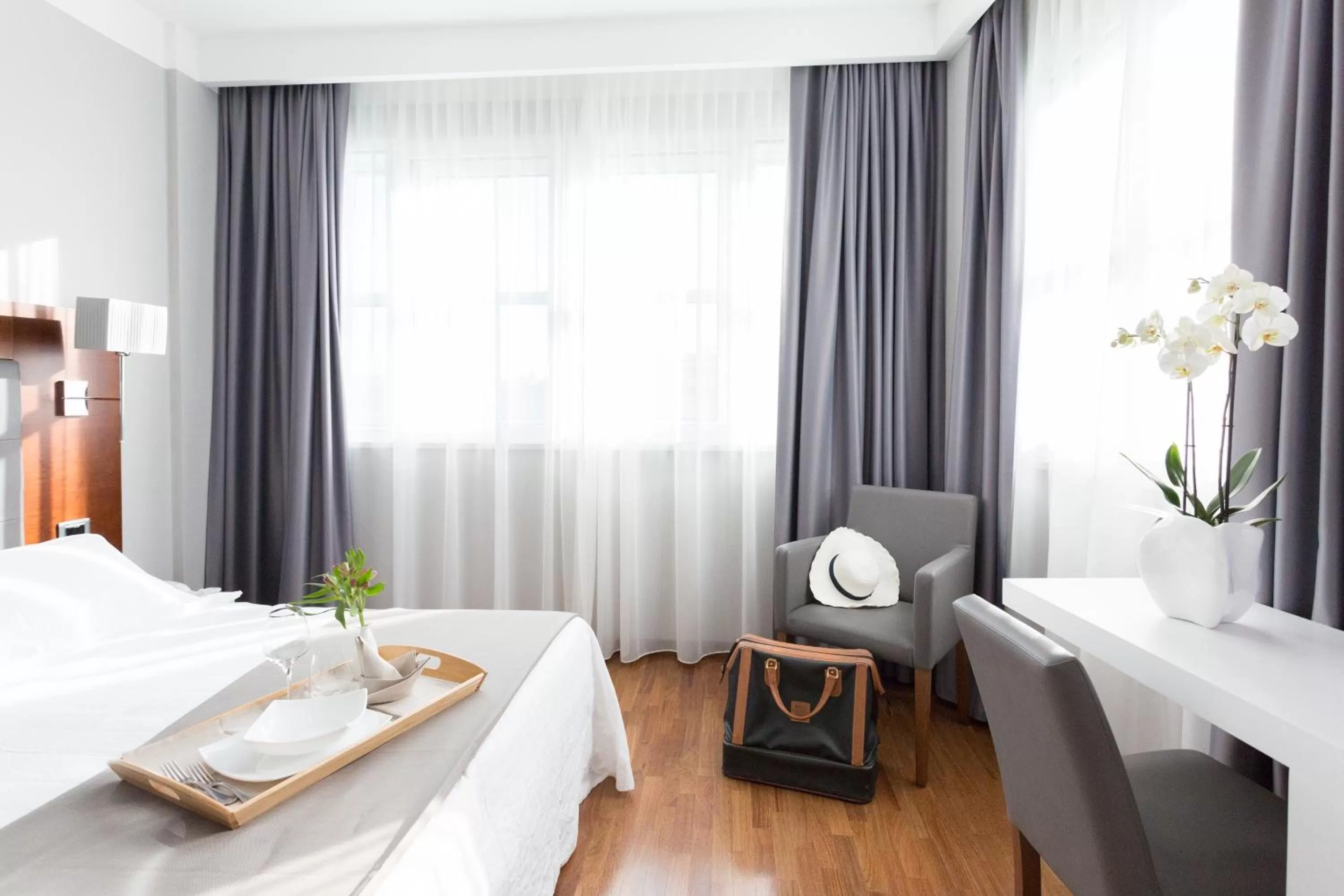 Bedroom, Bed in Raffaello Hotel & Mooka Restaurant