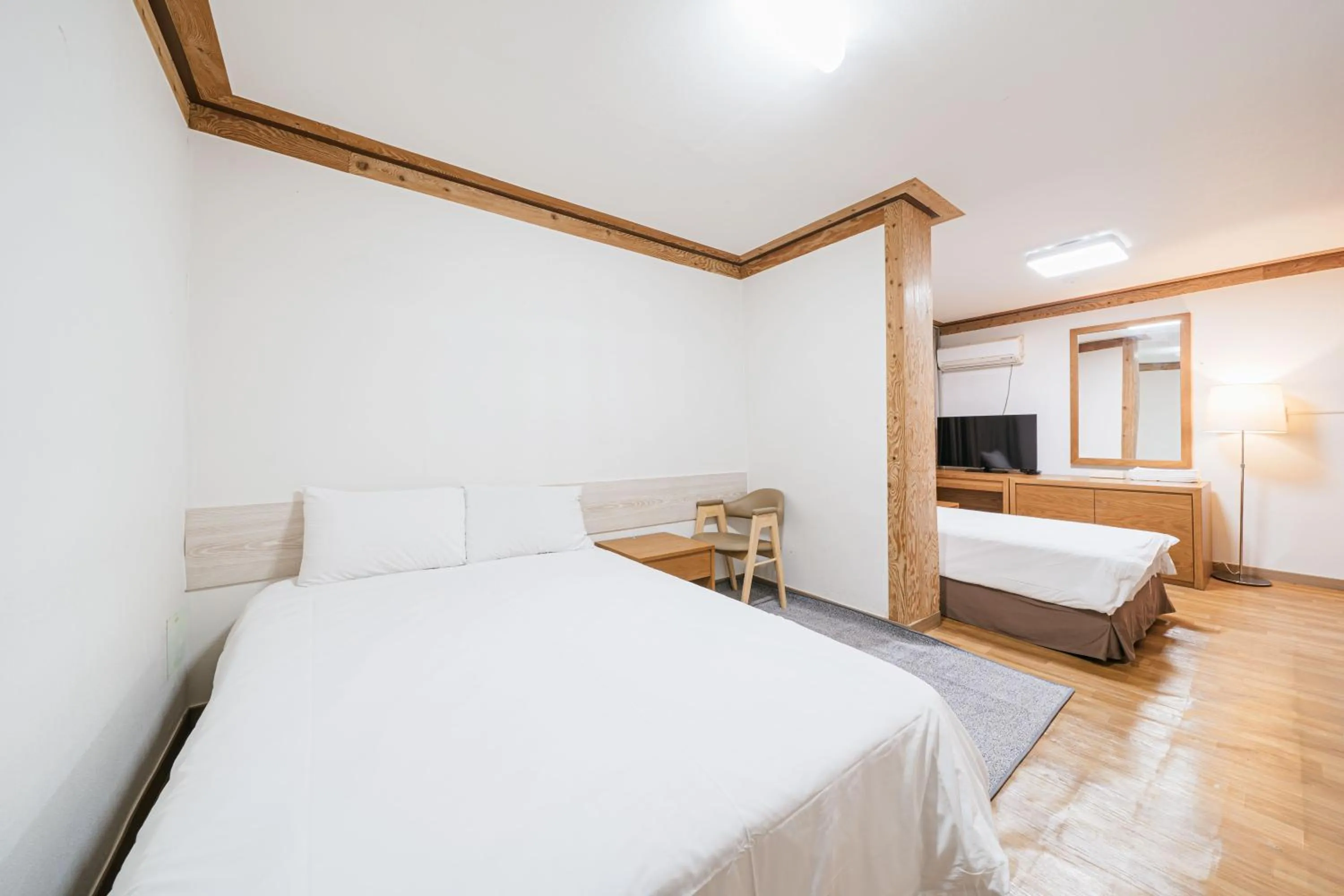 Bed in Jeju Miracle Hotel