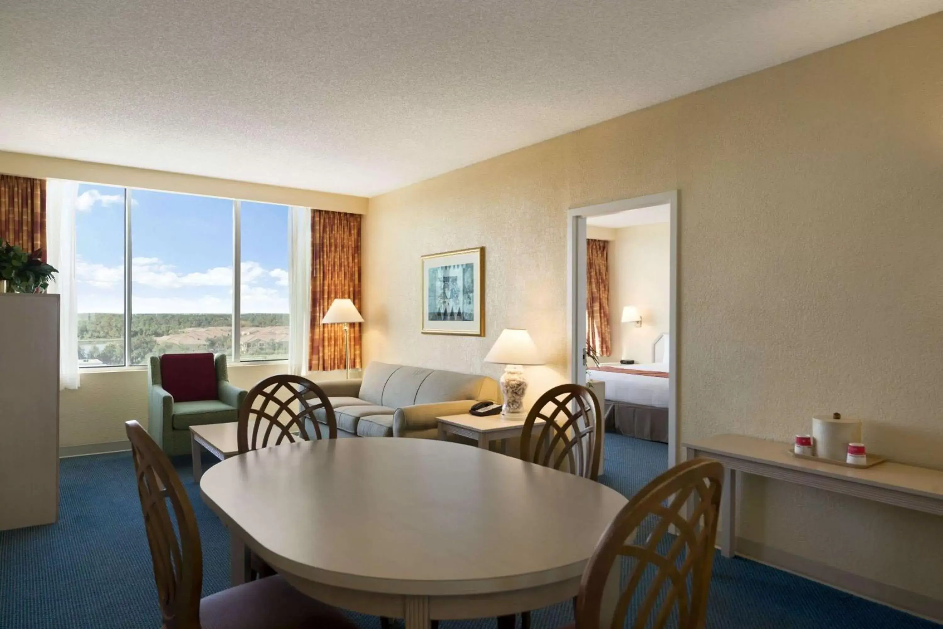 Photo of the whole room, Dining Area in Ramada by Wyndham Kissimmee Gateway