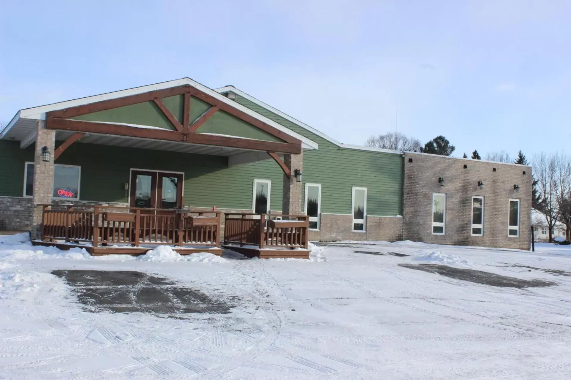 Property building, Winter in Woodland Inn & Suites