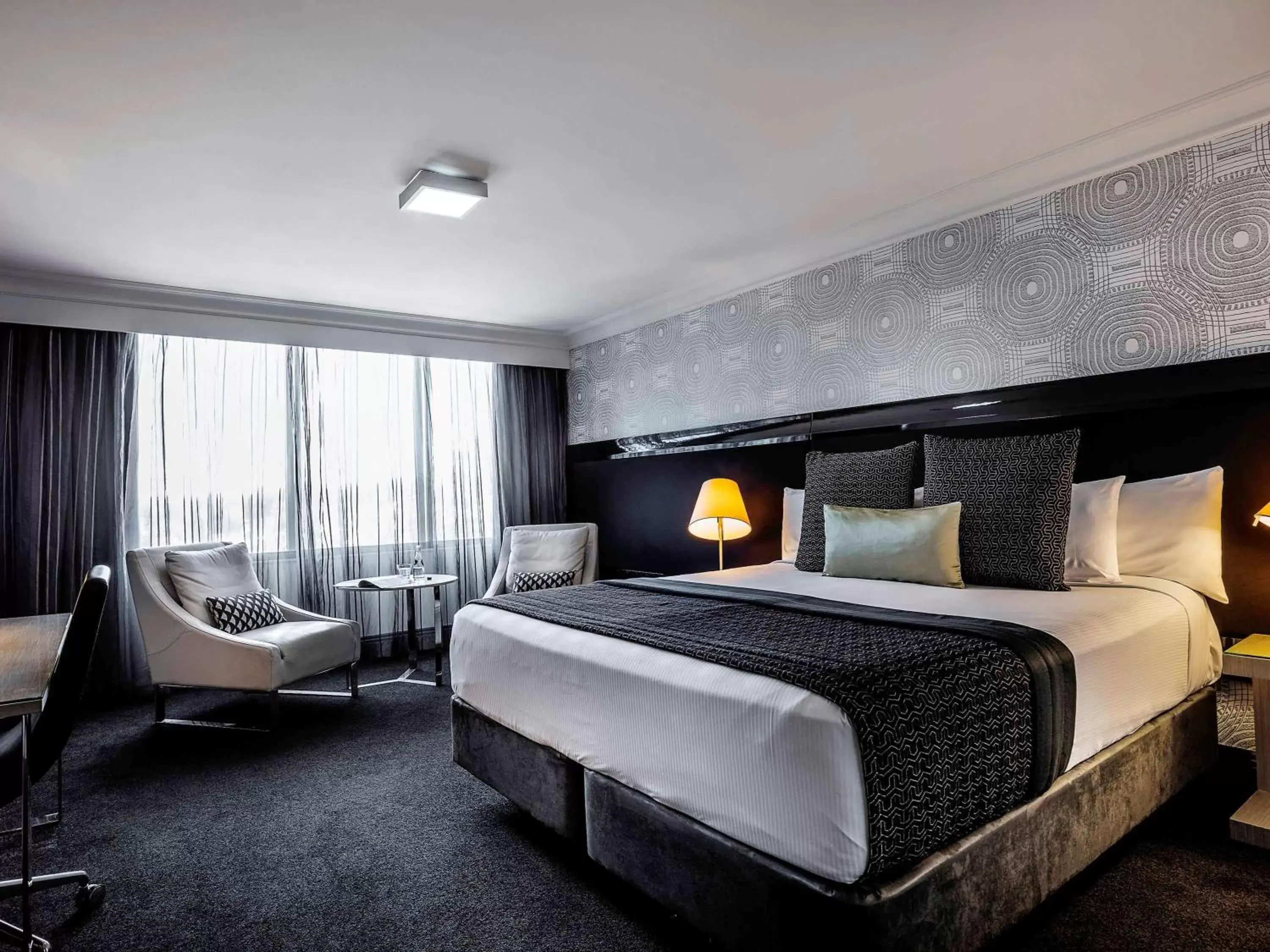 Photo of the whole room, Bed in Pullman Brisbane King George Square