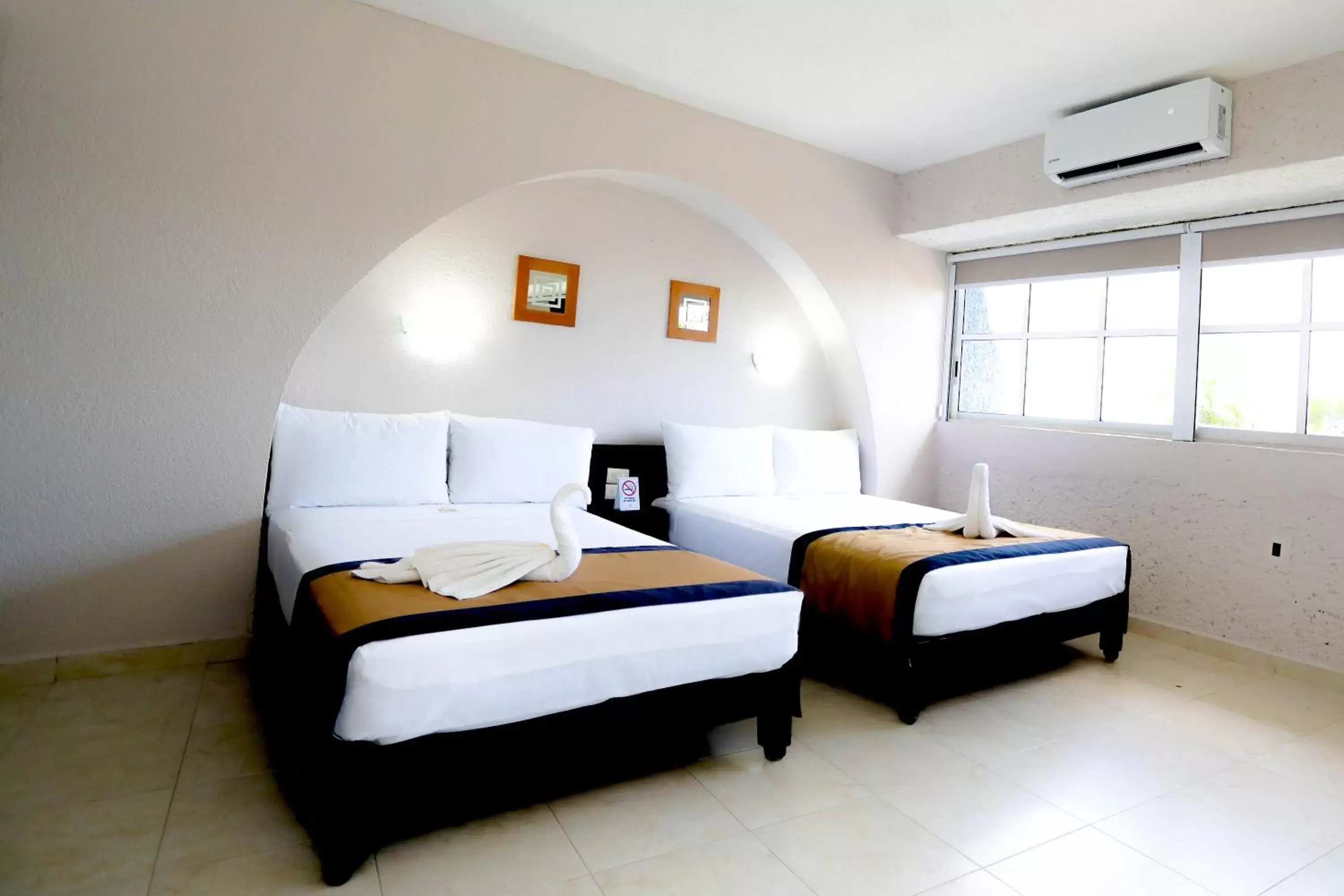 Bed in Hotel Caribe Internacional Cancun