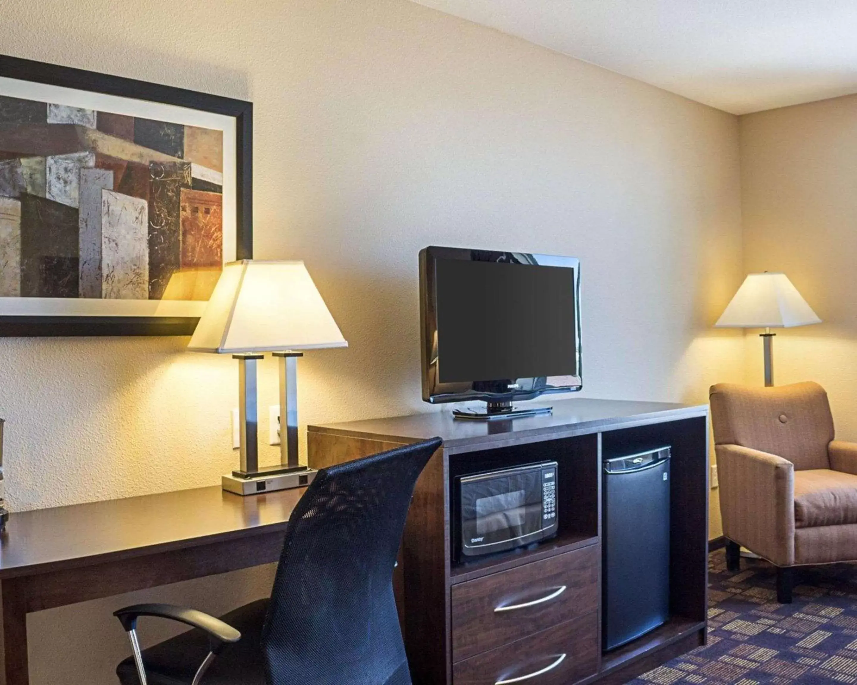 Photo of the whole room, TV/Entertainment Center in Quality Inn & Suites