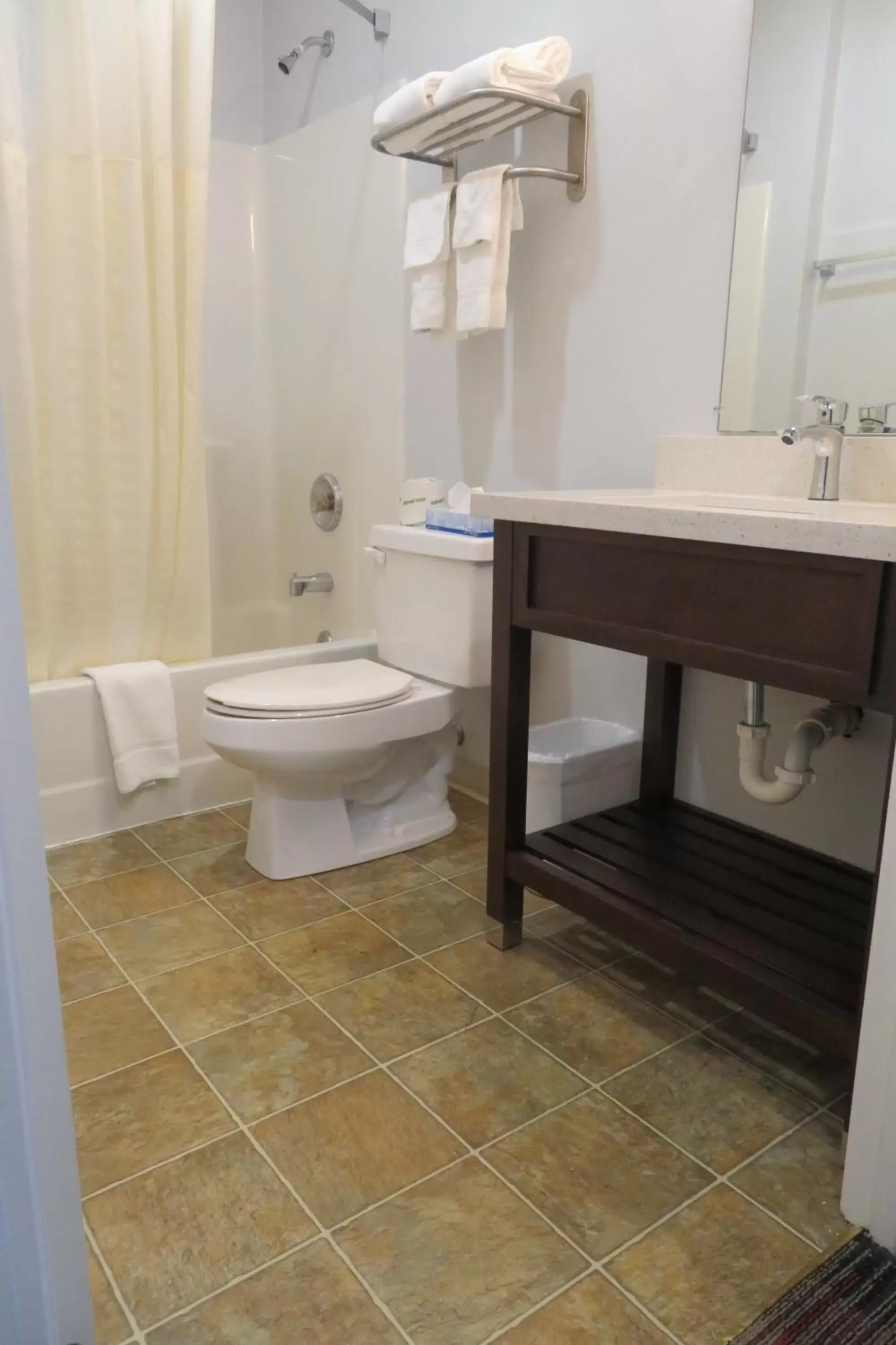 Bathroom in Luxbury Inn & Suites