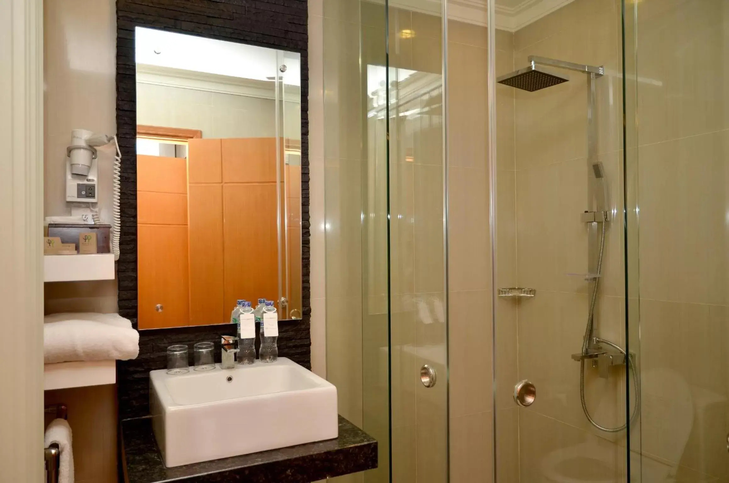 Bathroom in Surabaya Suites Hotel Powered by Archipelago