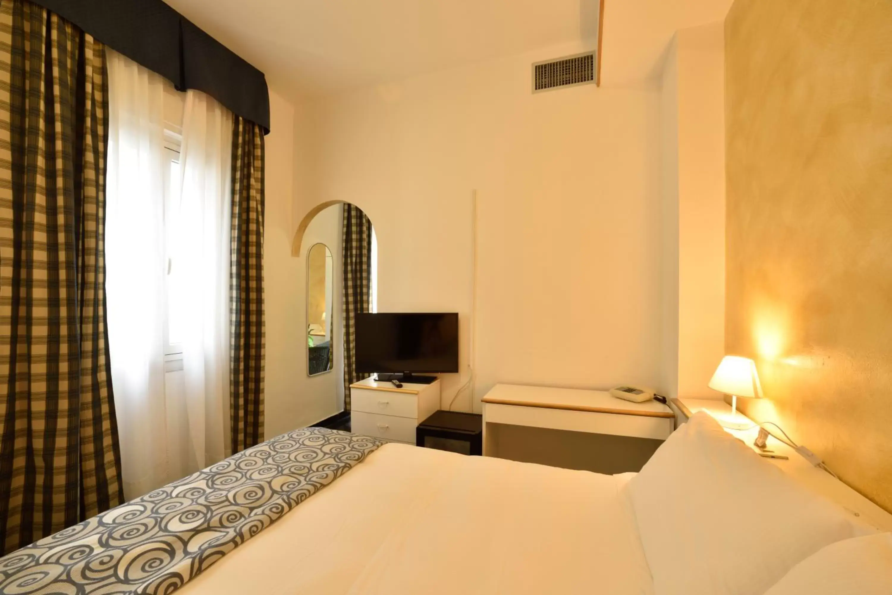 Photo of the whole room, Bed in Hotel Morchio Mhotelsgroup