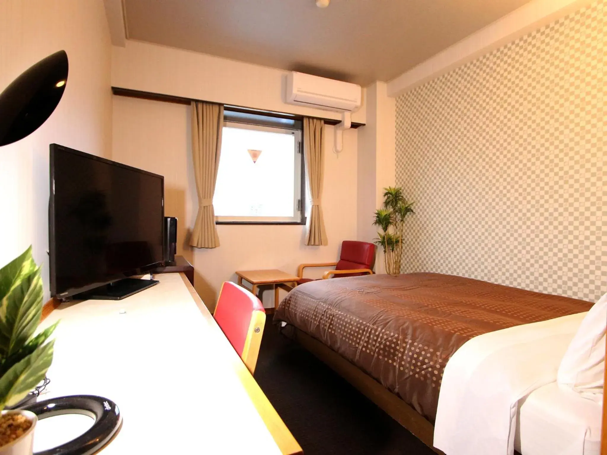 Bed in HOTEL LiVEMAX BUDGET Utsunomiya