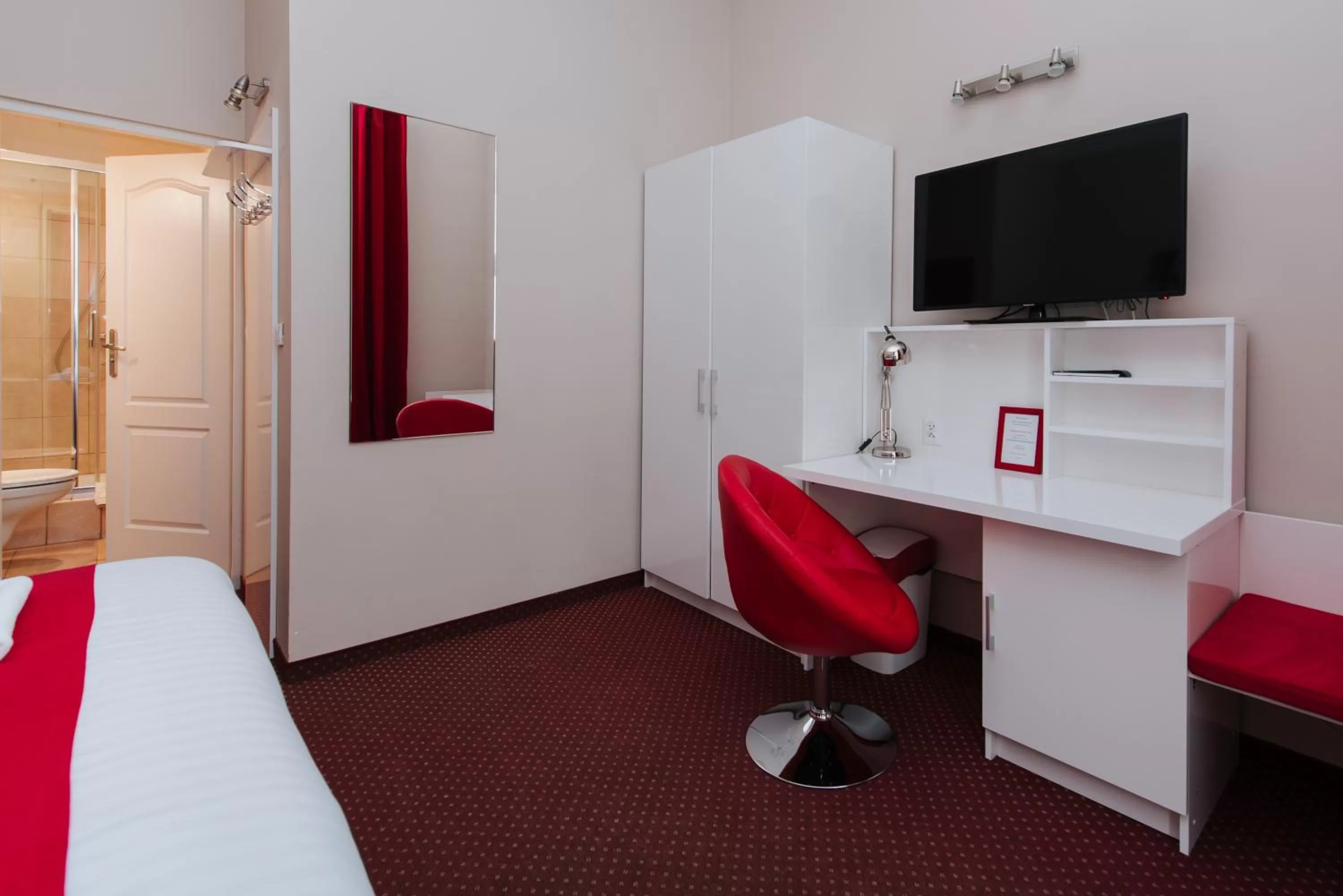 Bed in Rembrandt Aparthotel