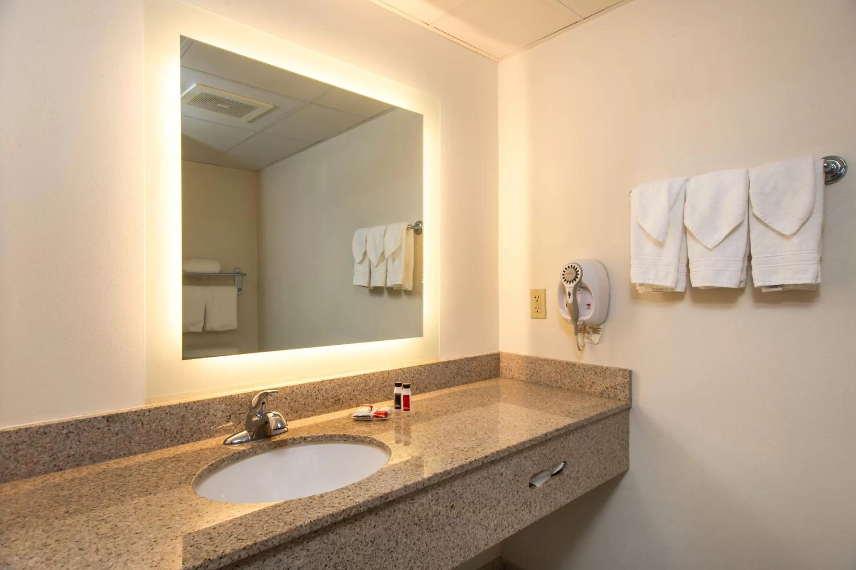 Bathroom in AmericInn by Wyndham Rapid City