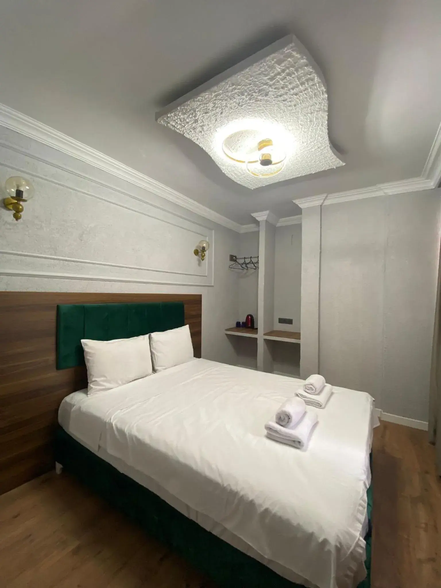 Bed in Aruna Boutique Hotel