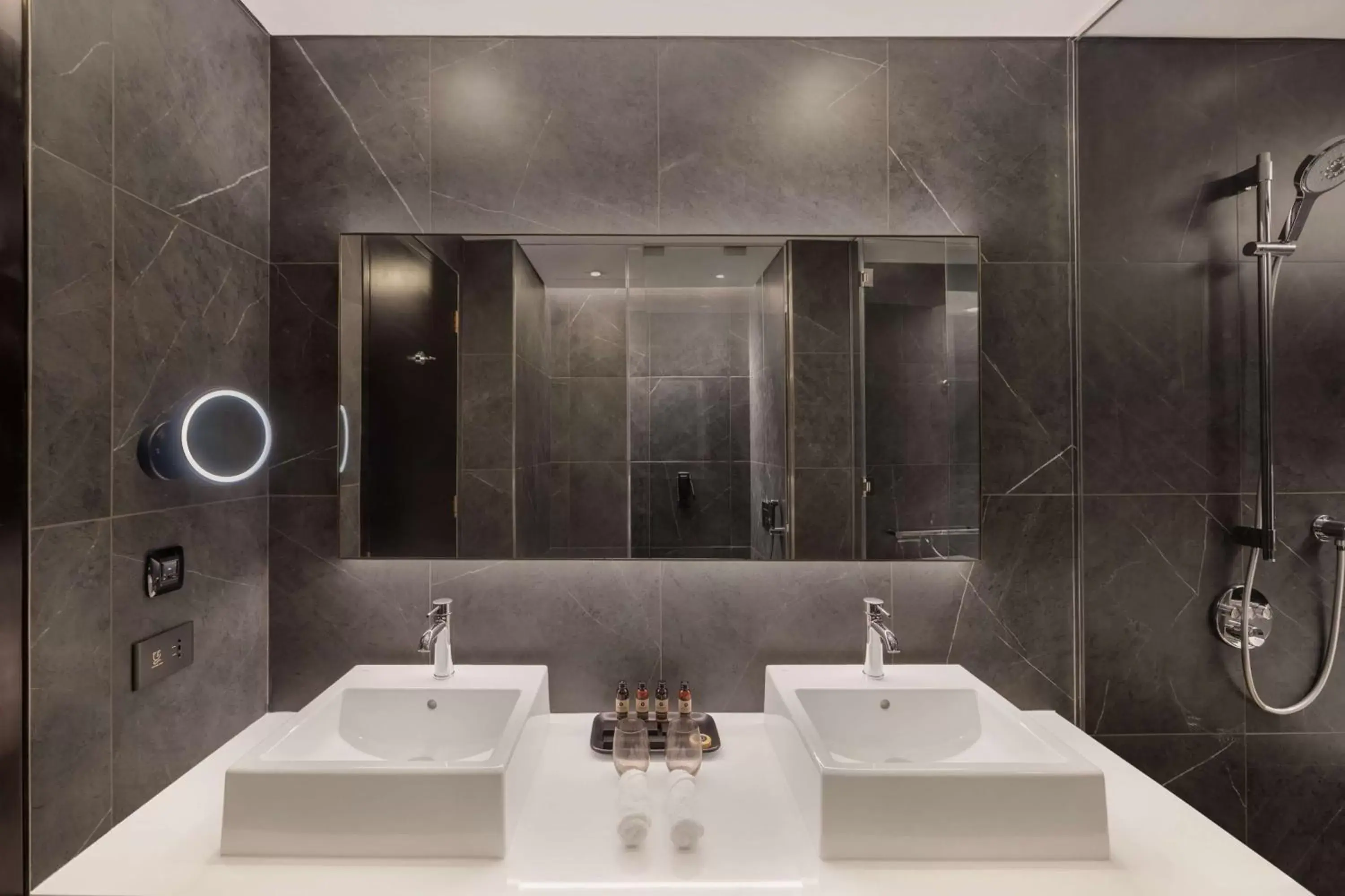 Bathroom in The WB Abu Dhabi, Curio Collection By Hilton