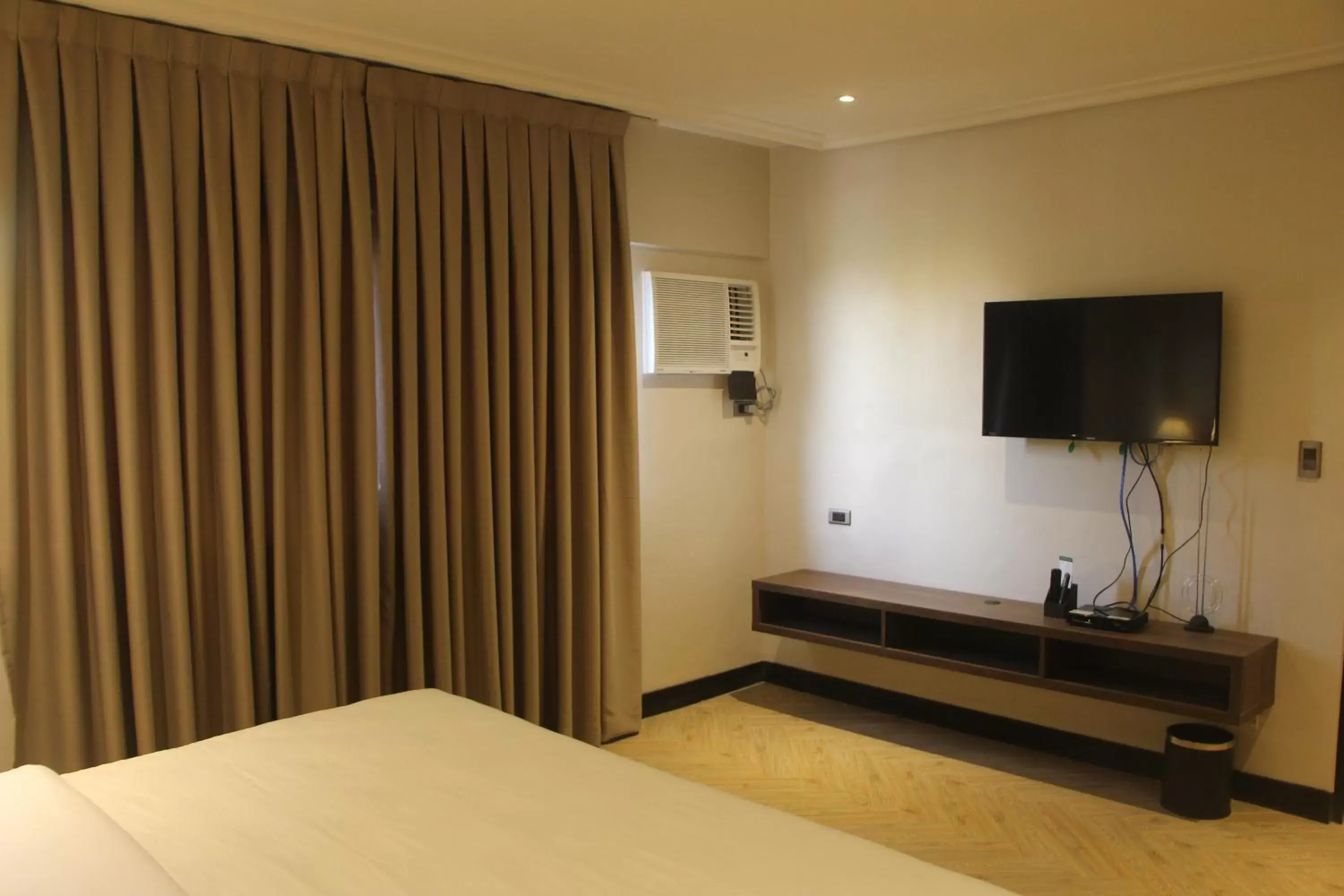 TV and multimedia, TV/Entertainment Center in Acacia Hotel Bacolod