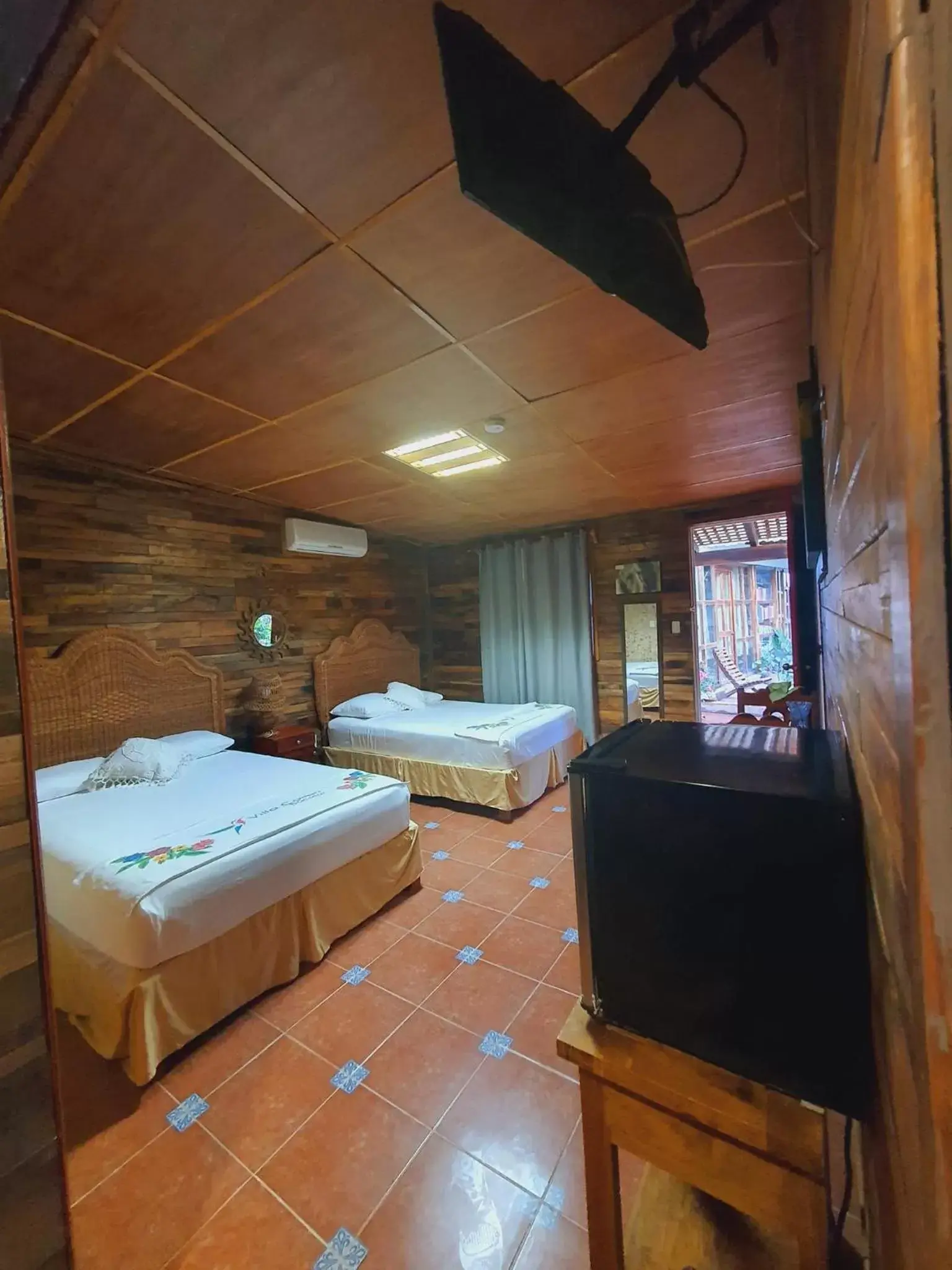 Photo of the whole room, Bed in Cabañas Colibrí