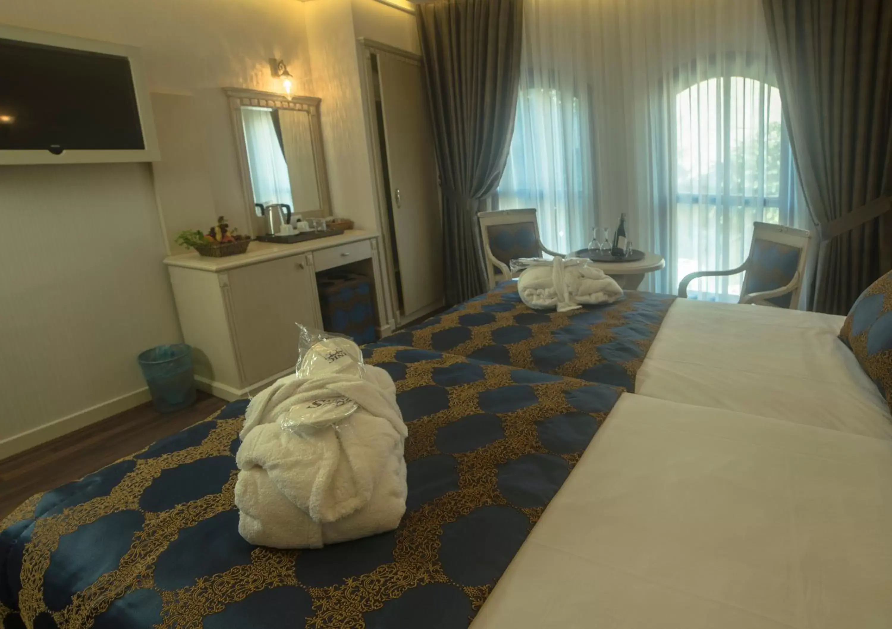 TV and multimedia, Bed in Sarnic Hotel & Sarnic Premier Hotel(Ottoman Mansion)
