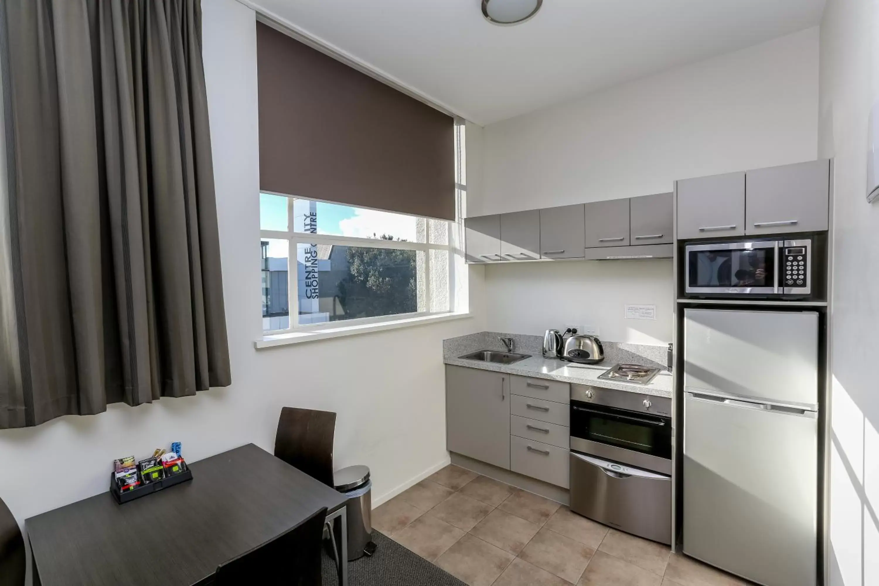 Dining area, Kitchen/Kitchenette in Quest New Plymouth Serviced Apartments