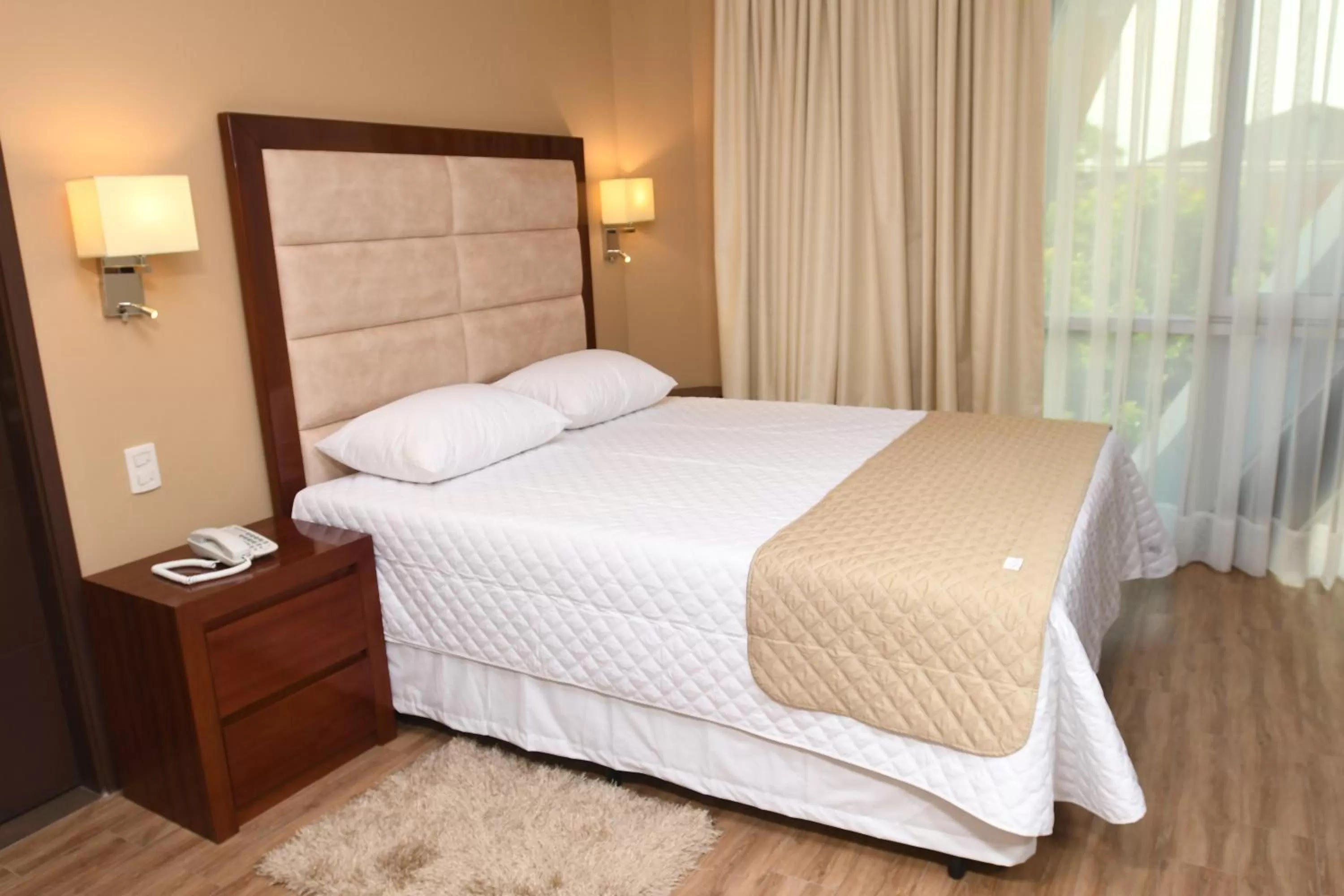 Bed in Taos Apart Hotel