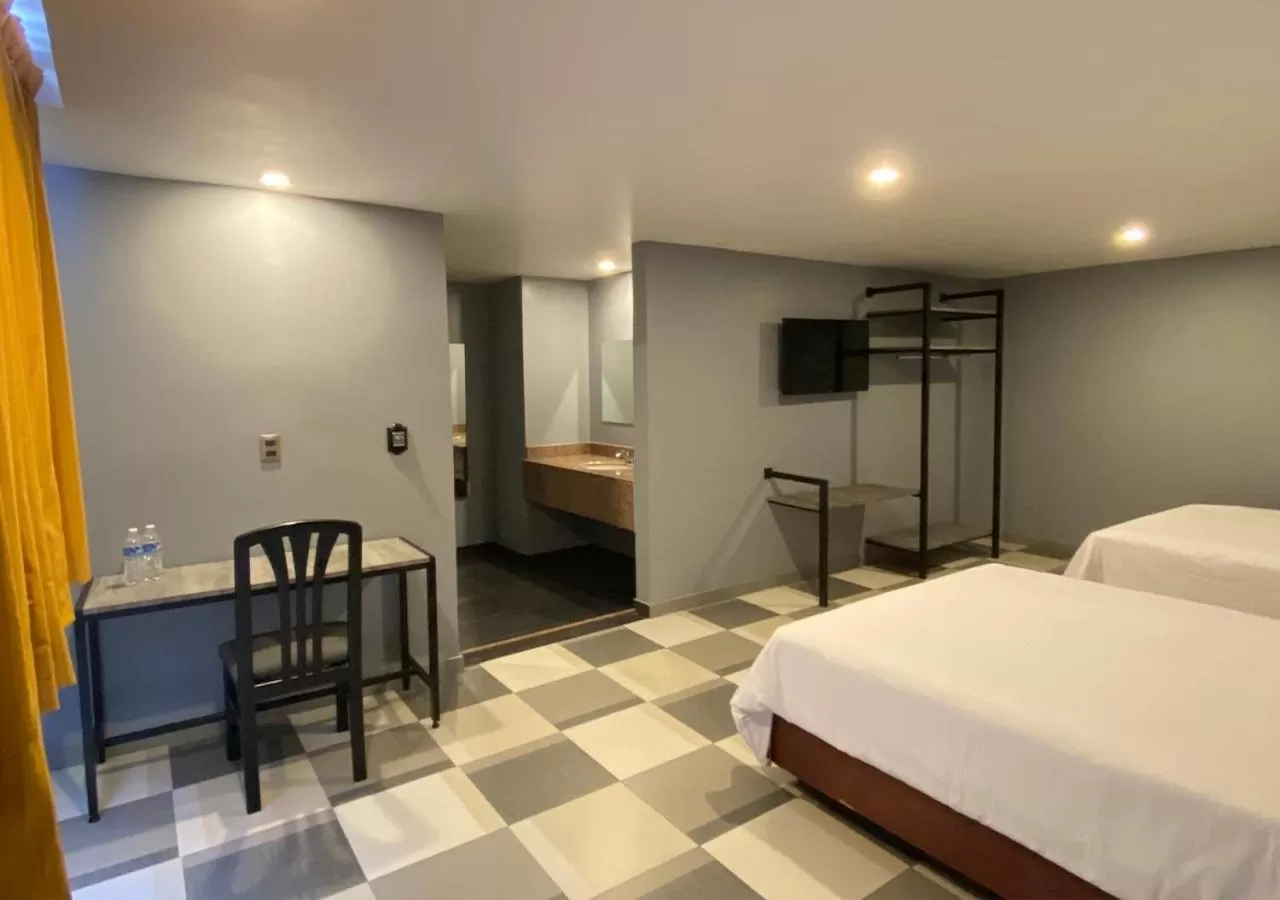 Photo of the whole room, Bed in Hotel Estrella de Oriente