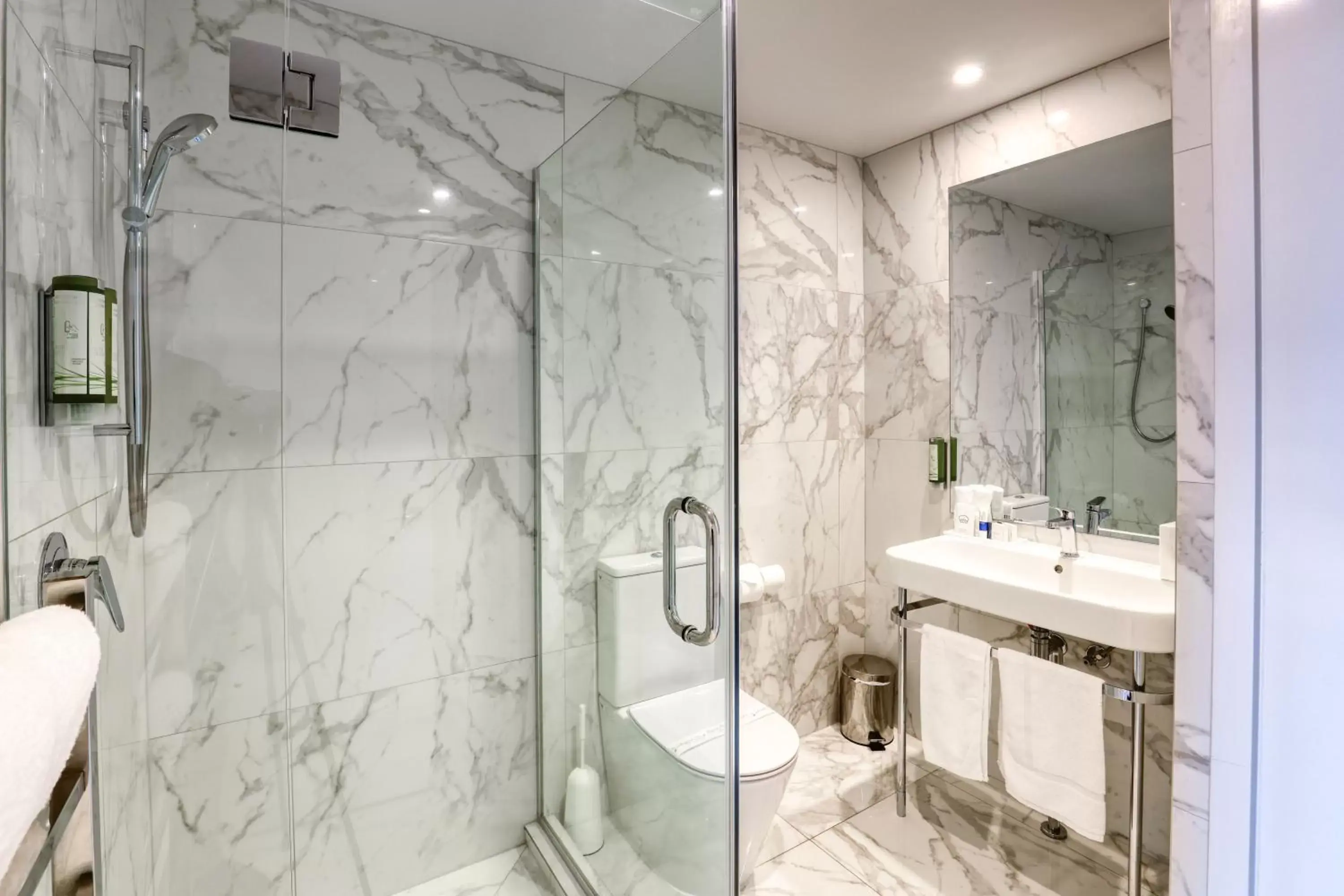 Bathroom in Ramada Suites by Wyndham Nautilus Orewa