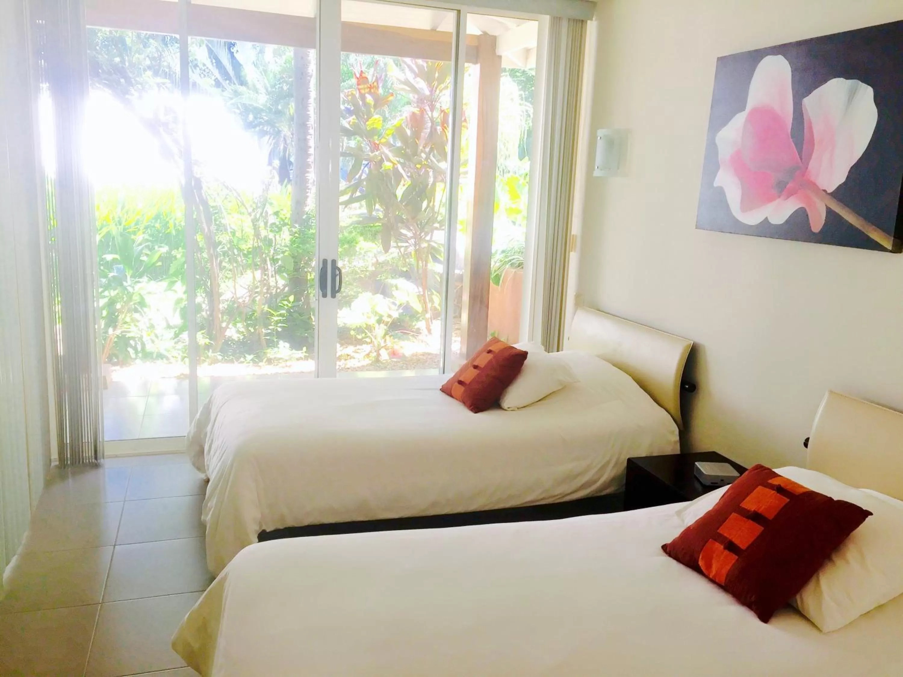 Bed in The Breeze Hotel & Villas