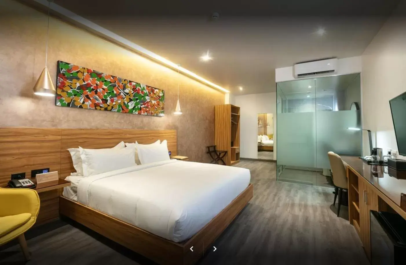 Bed in SureStay Plus Hotel by Best Western AC LUXE Angeles City