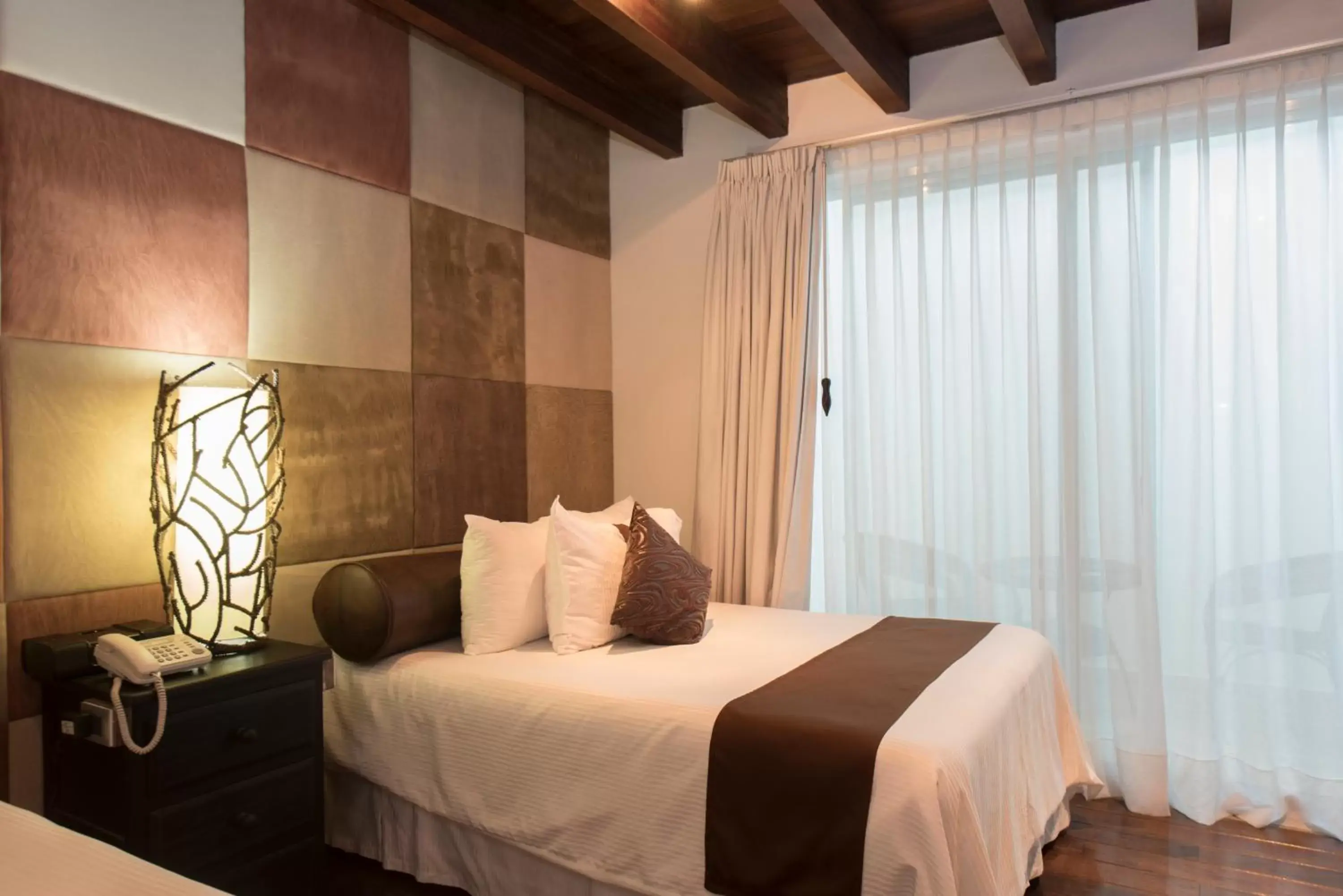 Bed in Colombe Hotel Boutique