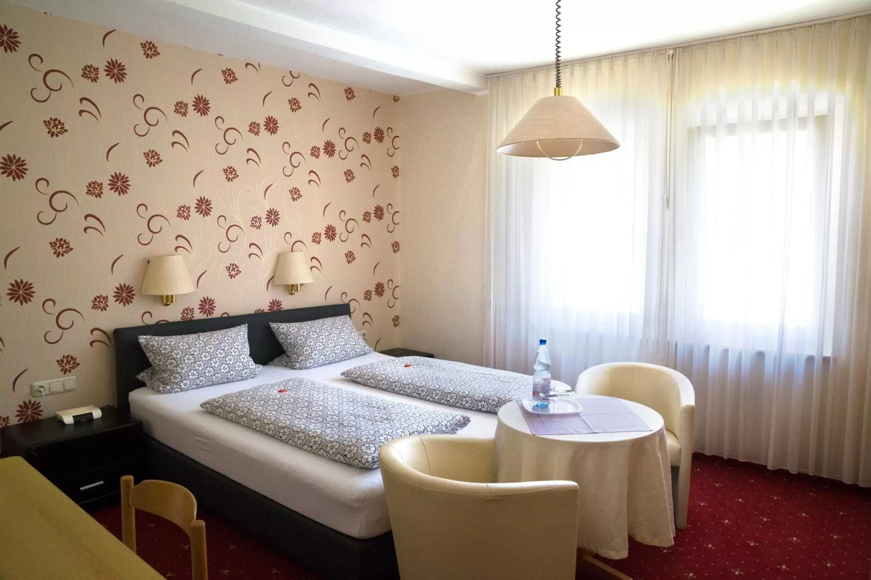 Bed in Haus am Kurpark Hotel Garni