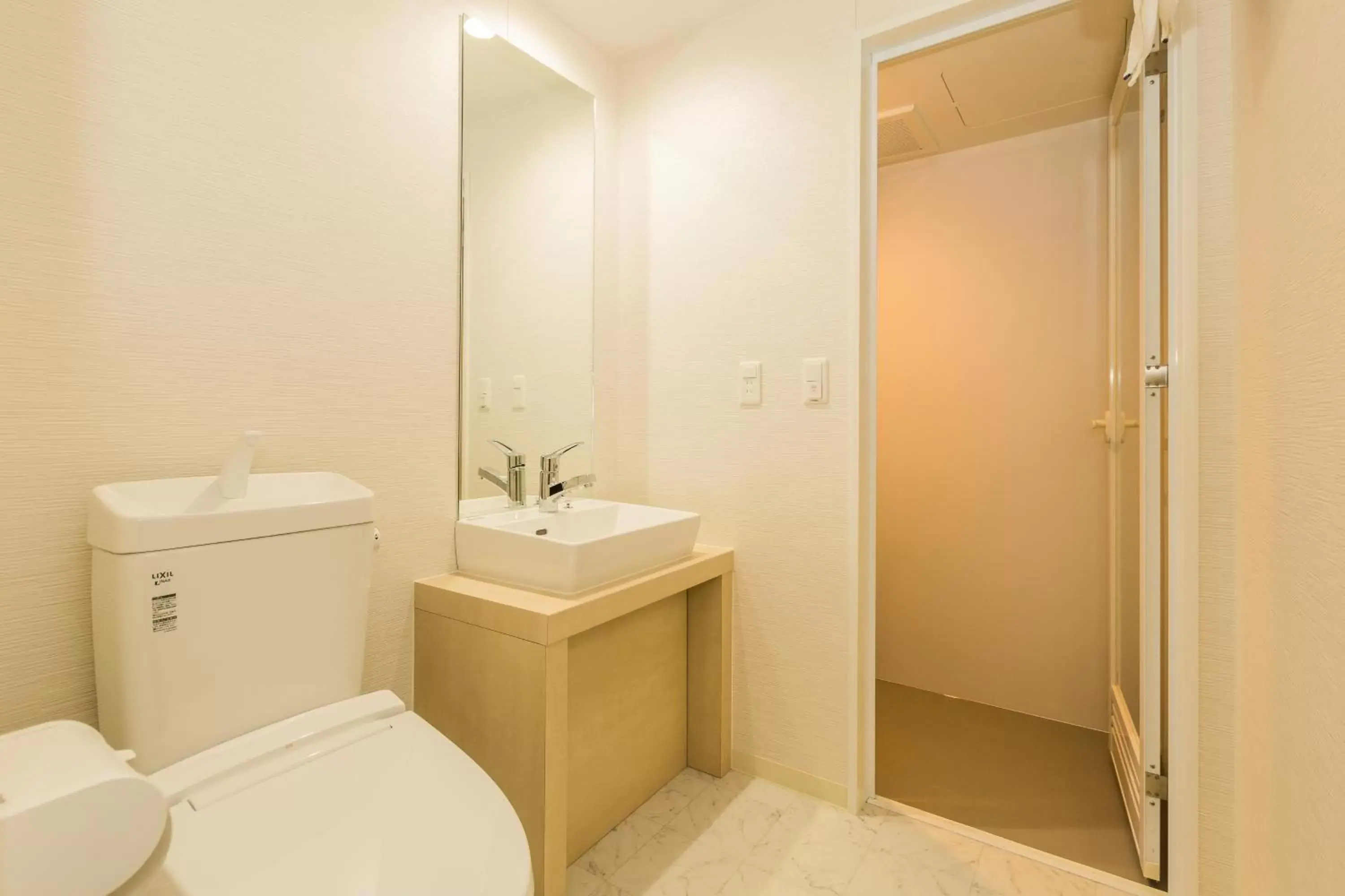 Photo of the whole room, Bathroom in Hotel Ninestates Hakata