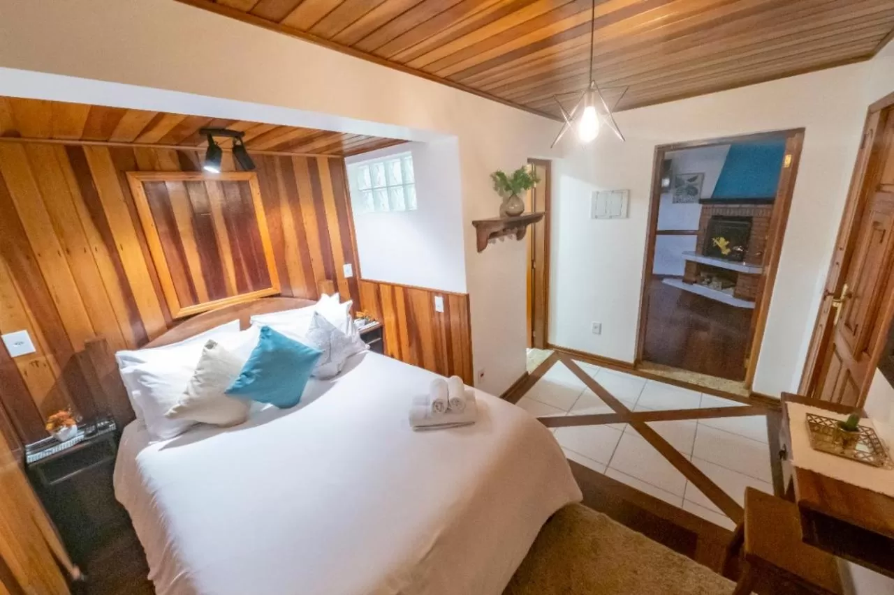 Bed in Pousada Ricanto Amore Mio