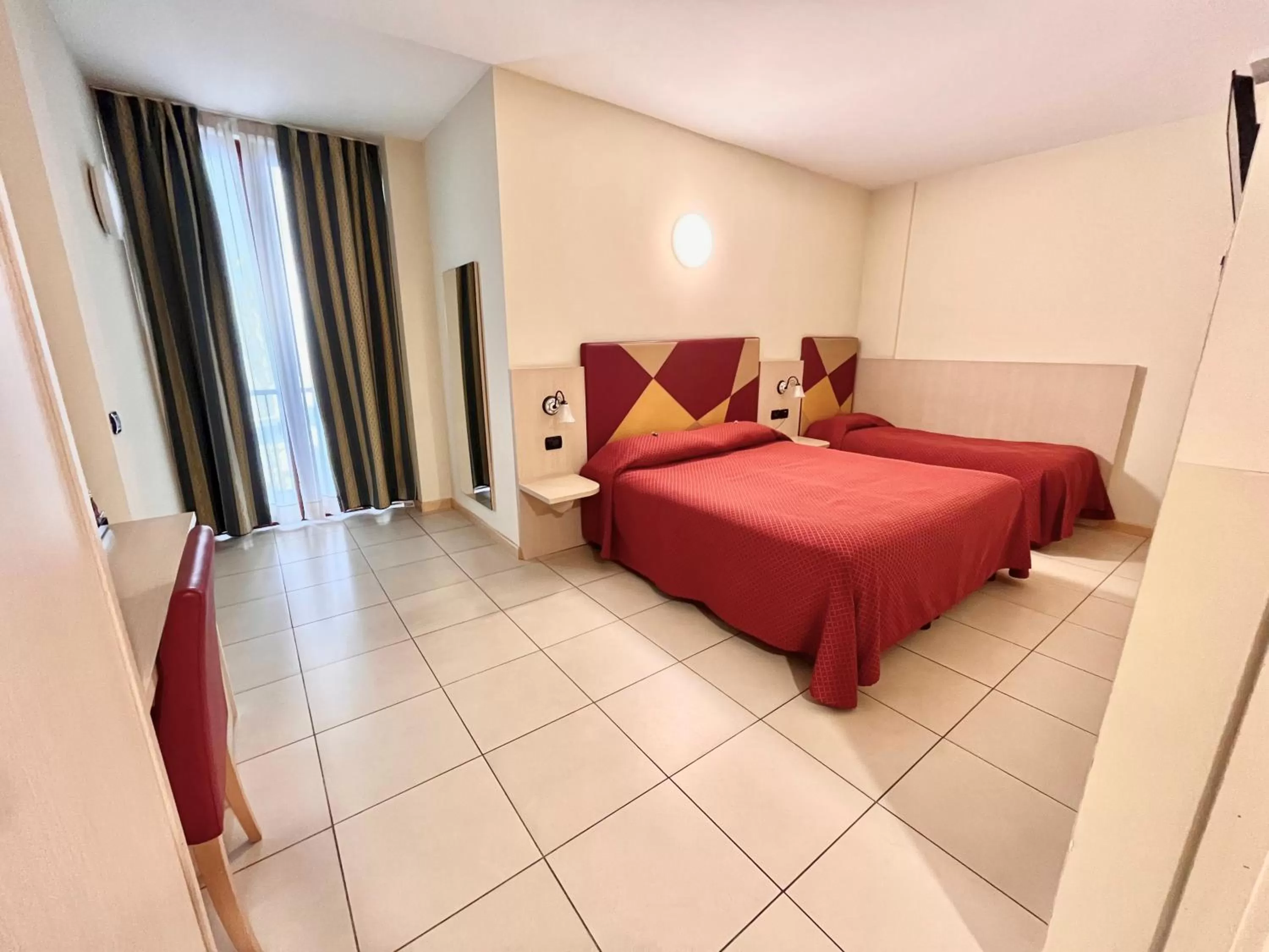 Bed in Hotel Lovere Resort & Spa