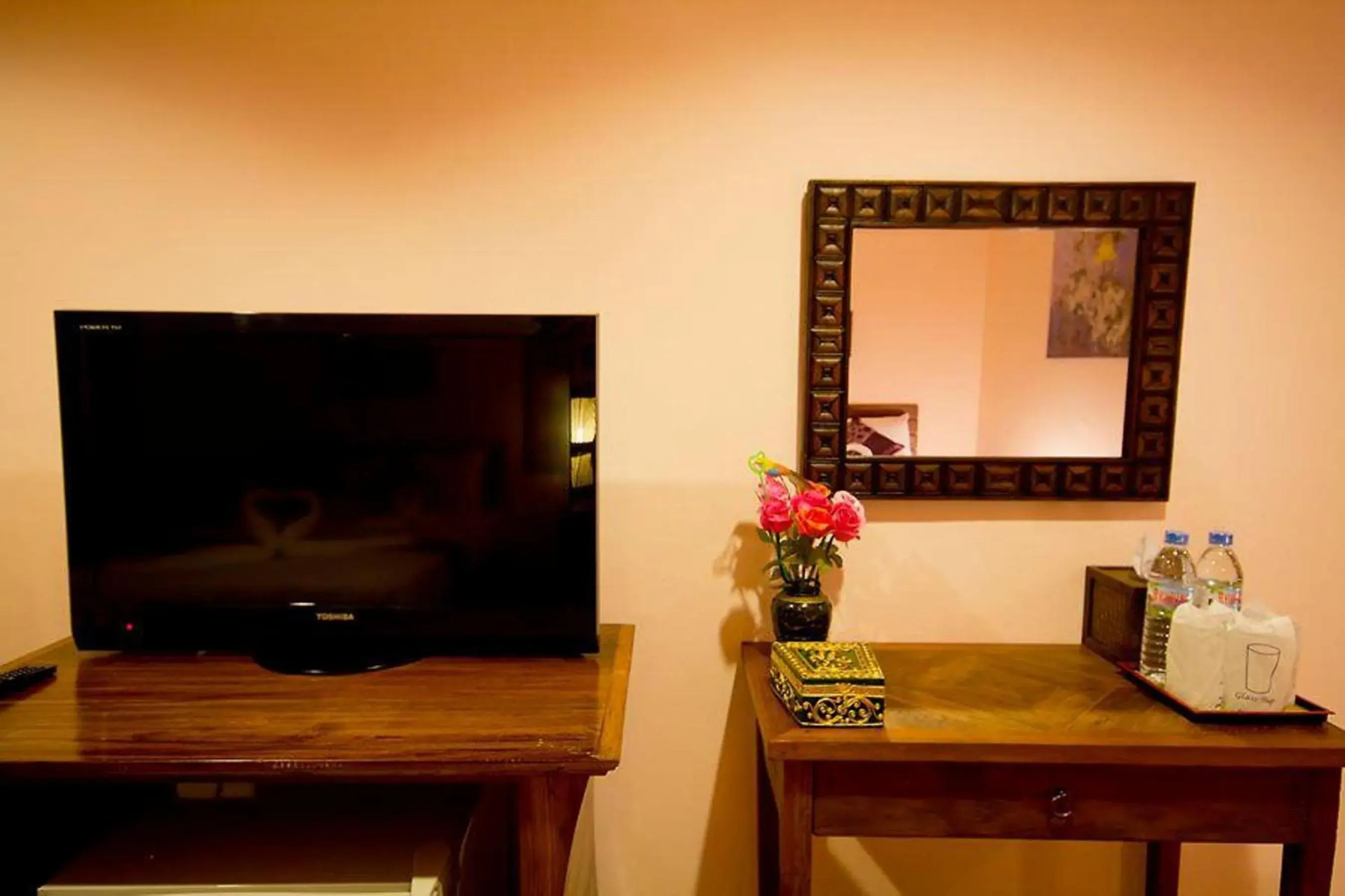 Photo of the whole room, TV/Entertainment Center in The Sylvana Pai Hotel