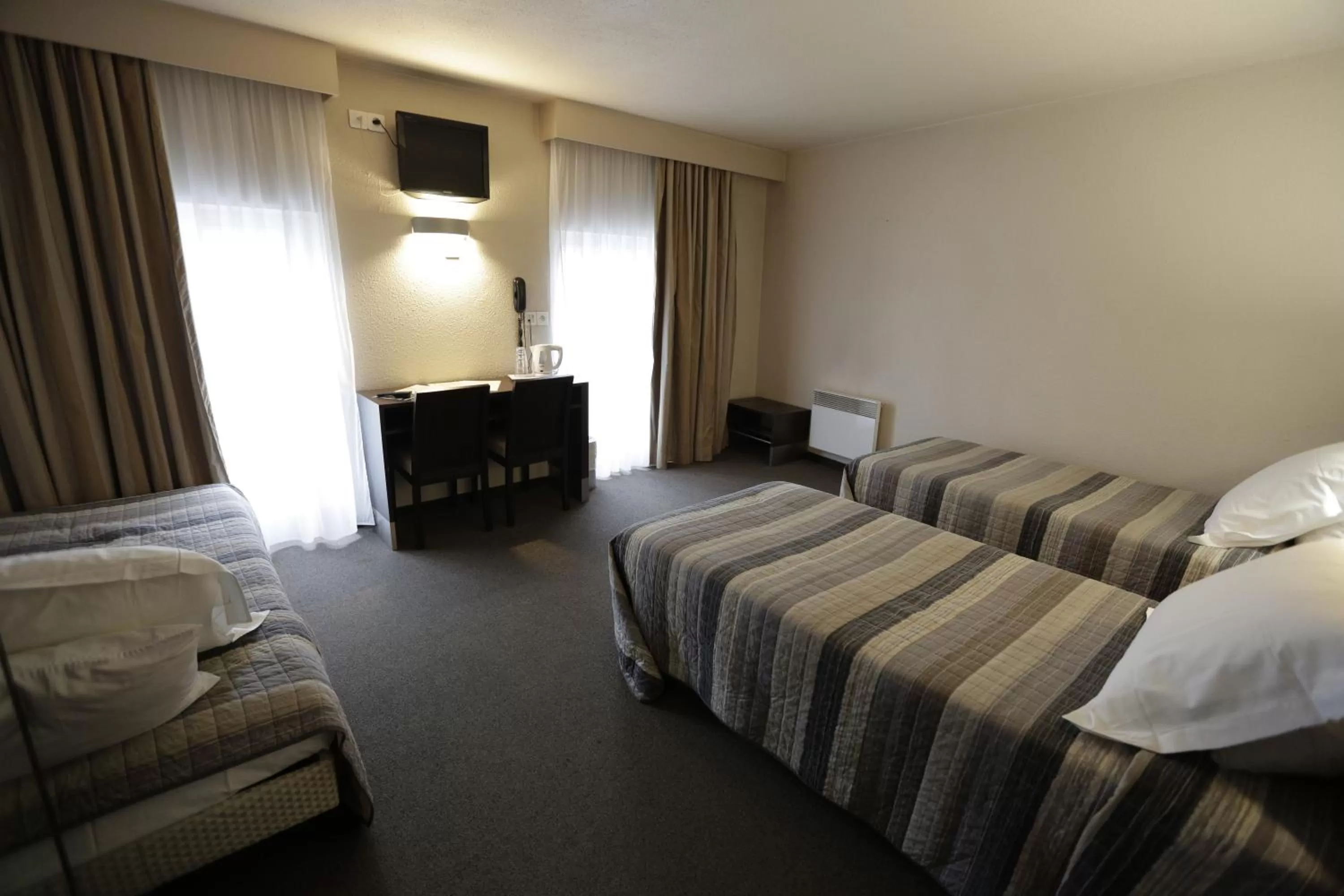 Bedroom, Bed in Hôtel Au Petit Caporal