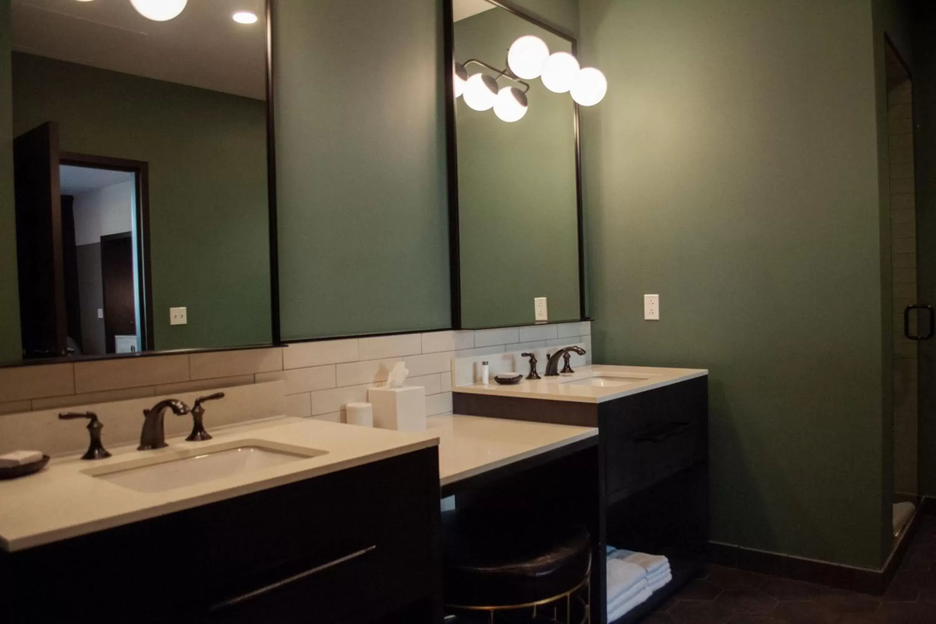 Bathroom in Cyrus Hotel, Topeka, a Tribute Portfolio Hotel