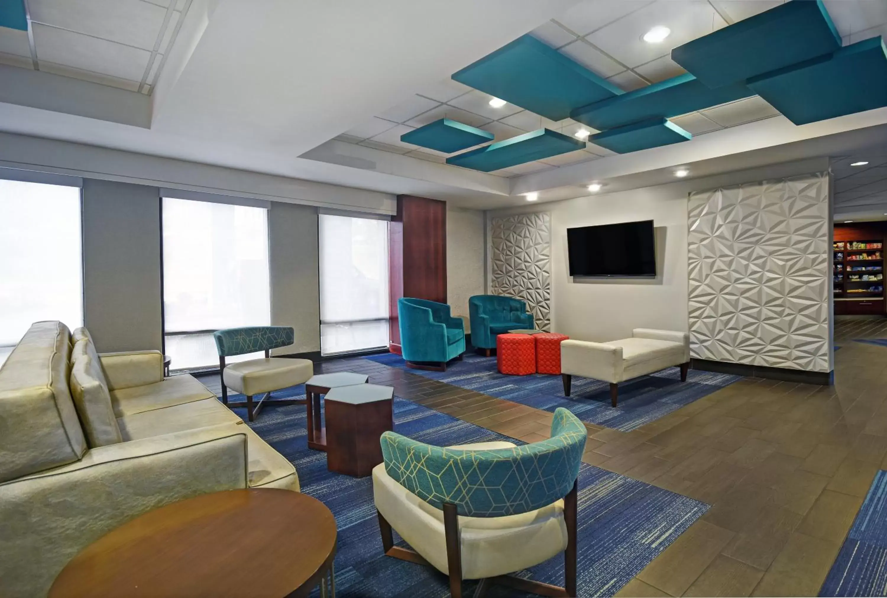 Property building, Seating Area in Holiday Inn Express & Suites Cincinnati Riverfront, an IHG Hotel
