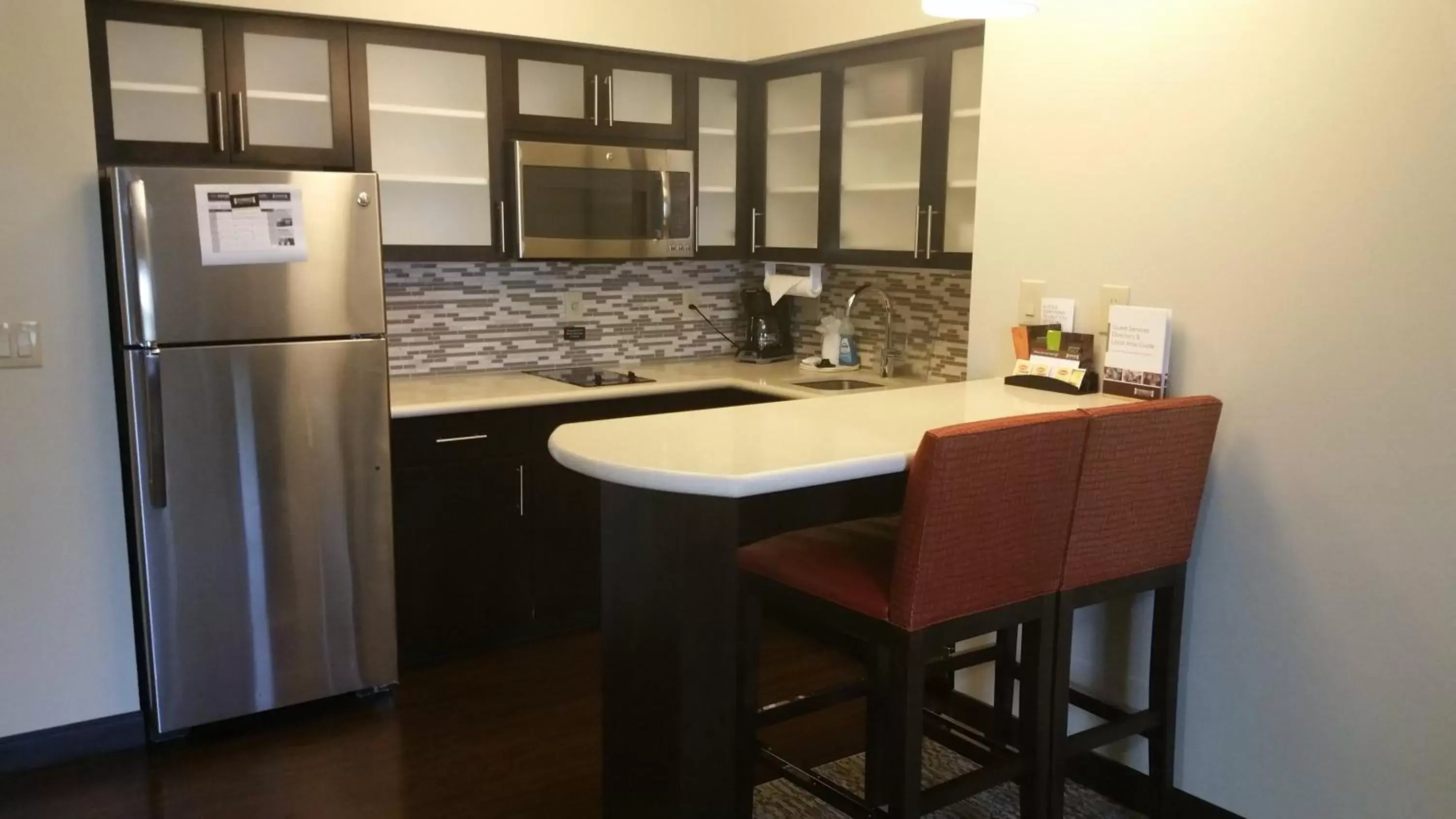 Photo of the whole room, Kitchen/Kitchenette in Staybridge Suites College Station, an IHG Hotel