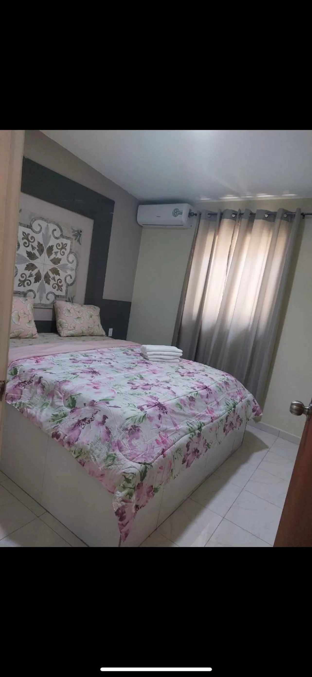 Bed in Curasita colour Appartments