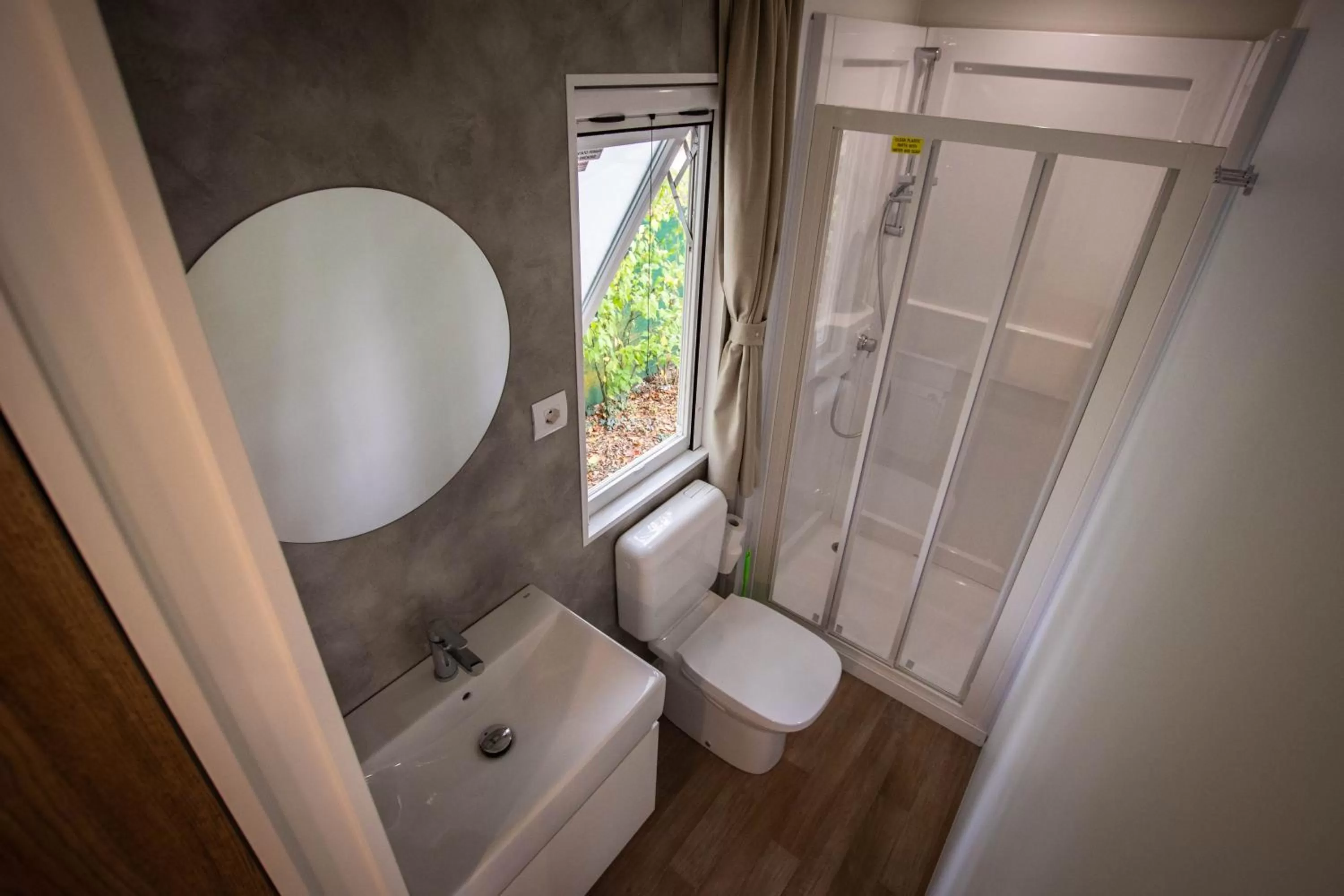 Bathroom in AgriCamping AlbaVillage Hotel & Wellness