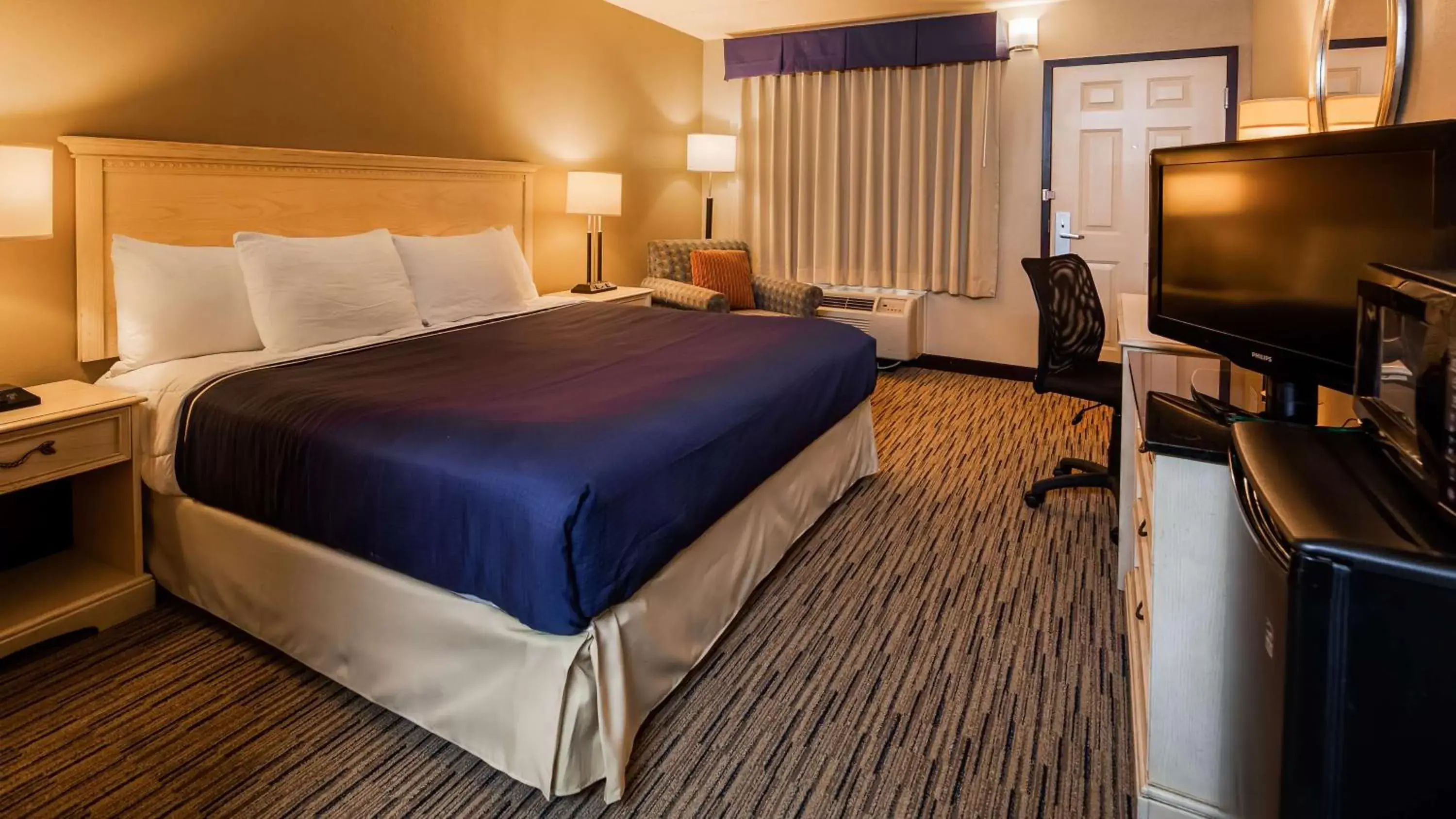 Photo of the whole room, Bed in SureStay Hotel by Best Western Tupelo North