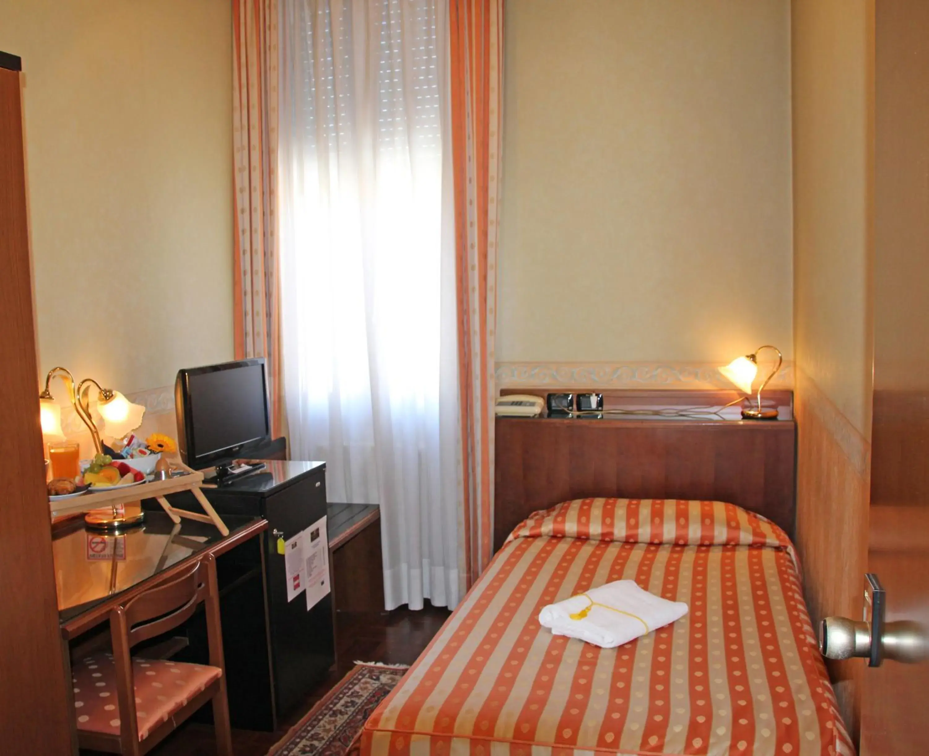 Photo of the whole room, Bed in Albergo Ristorante Leon d'Oro Photo of the whole room, Bed in Albergo Ristorante Leon d'Oro